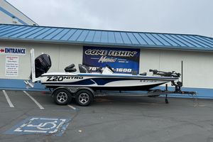 2022 Nitro Z20 Pro boat parked outside a fishing store.