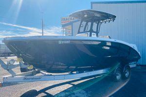 2023 Yamaha Boats 255 FSH Sport E on trailer under clear blue sky.