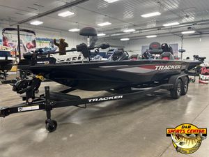 2025 Tracker Savage 215 boat on trailer in showroom, featuring sleek design and modern equipment.