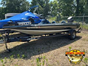 1999 Javelin Renegade 19 SC boat on trailer, outdoors at D&R Sports Center.