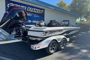 2026 Nitro Z21 XL Pro boat on trailer, parked outside a building.