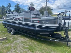 2022 Ranger 220 F pontoon boat on trailer, parked outdoors.
