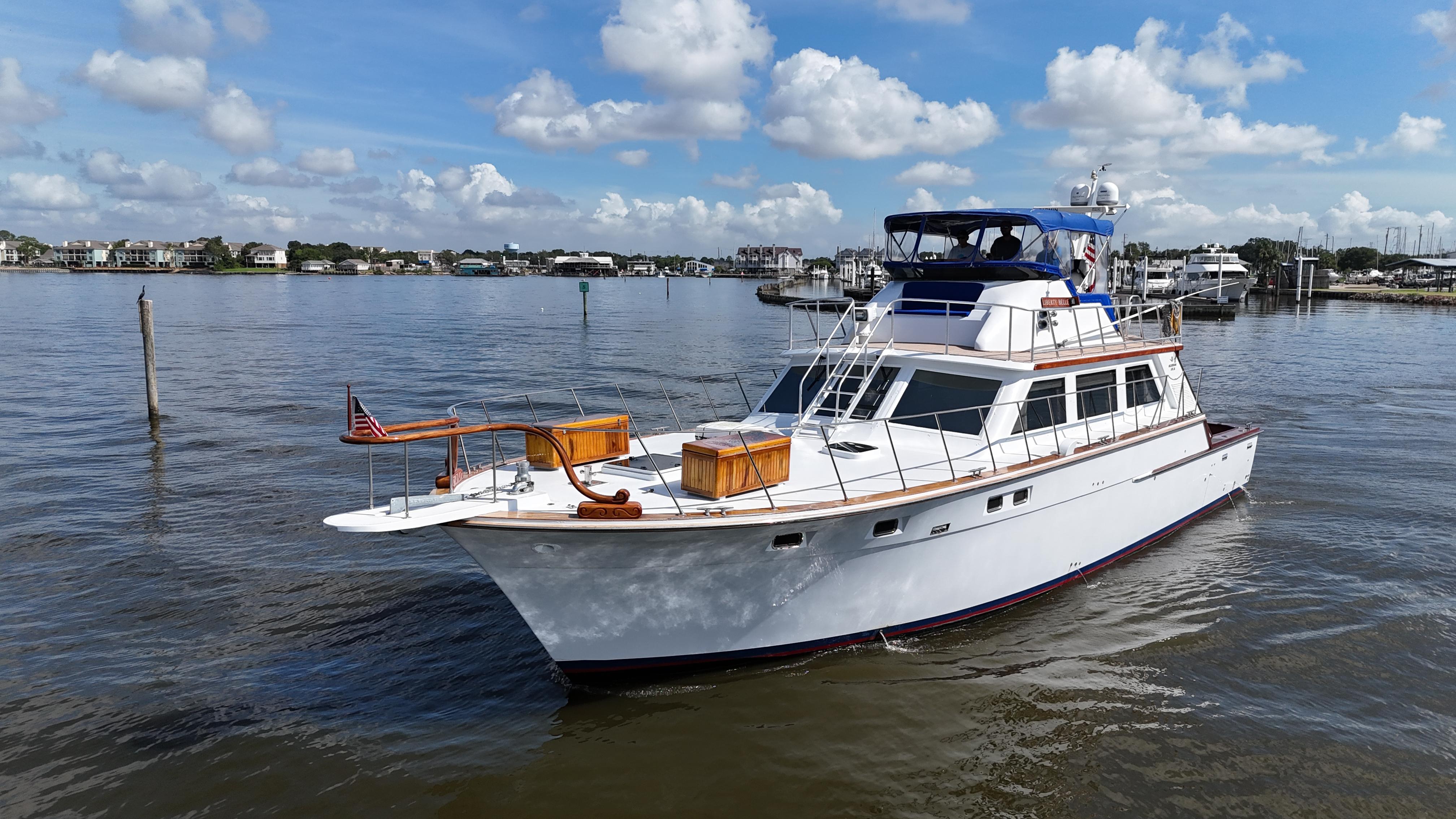 Bertram-58 Convertible Custom Total Rebuild 2010 1980-Liberty Belle TX-US-1980 Bertram 58 Convertible Custom yacht on calm water under a blue sky.-9430006 | Thumbnail