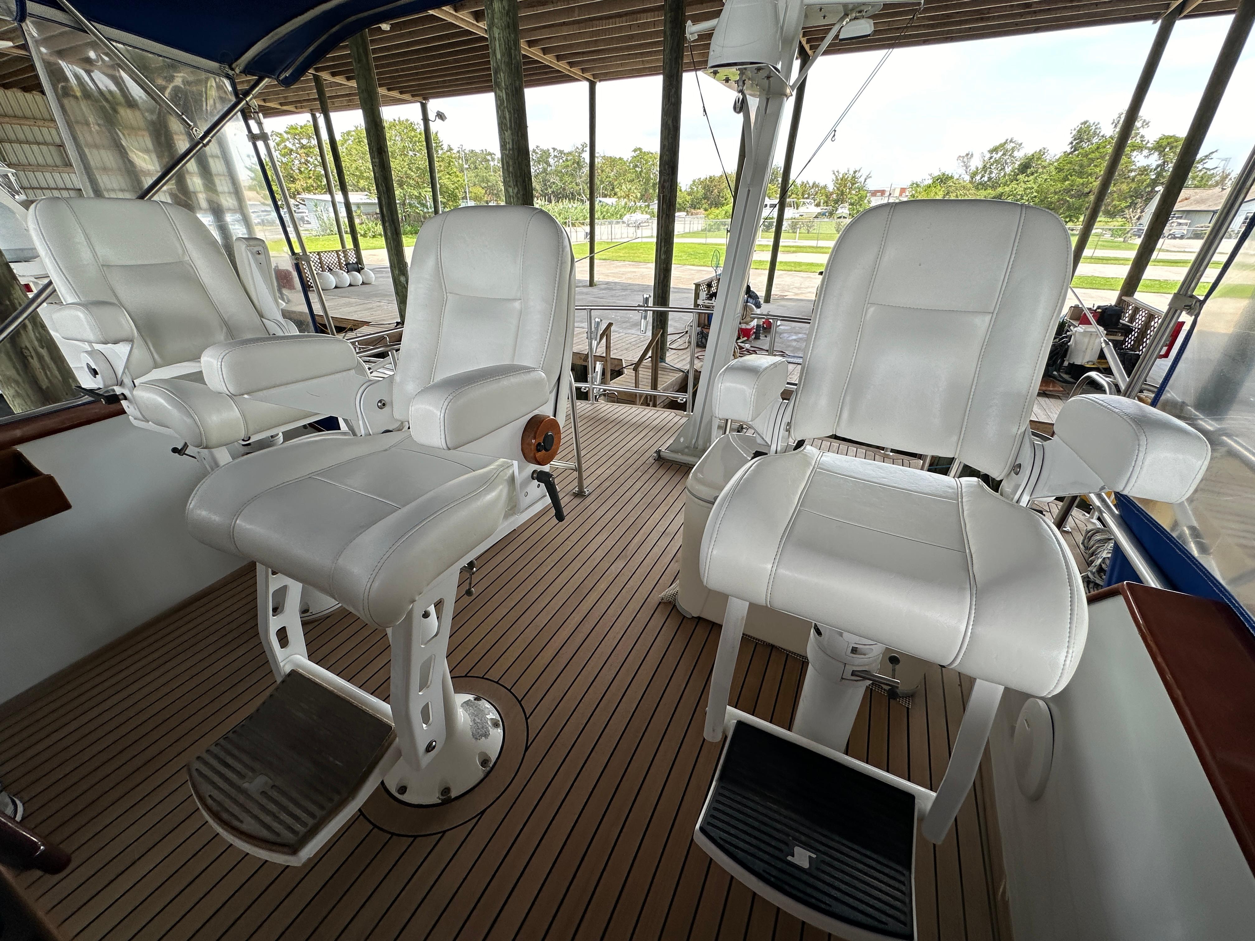 Bertram-58 Convertible Custom Total Rebuild 2010 1980-Liberty Belle TX-US-1980 Bertram 58 Convertible Custom yacht with white captain chairs on teak deck.-9430006 | Thumbnail