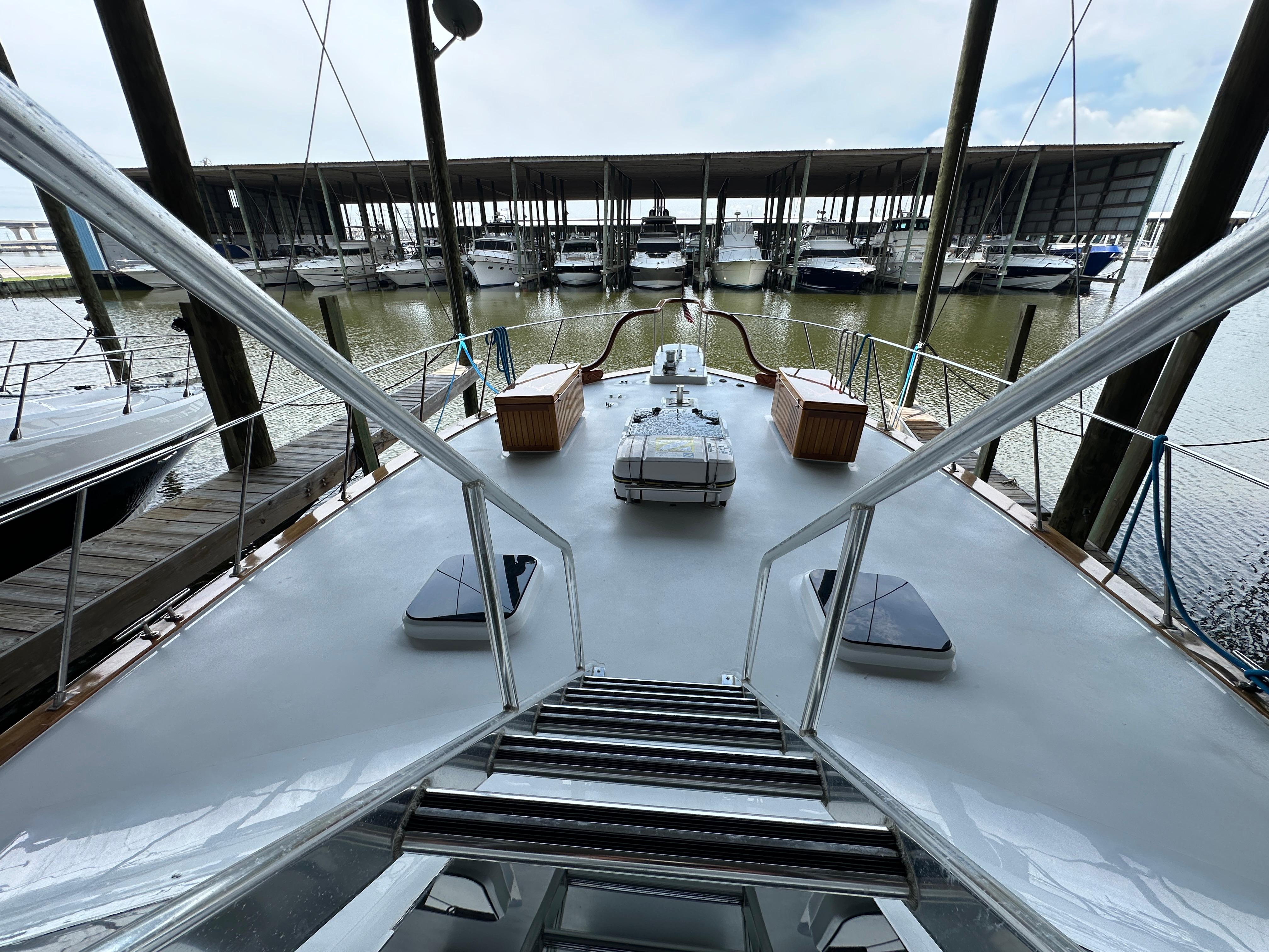 Bertram-58 Convertible Custom Total Rebuild 2010 1980-Liberty Belle TX-US-1980 Bertram 58 Convertible Custom yacht docked in marina, view from deck.-9430006 | Thumbnail