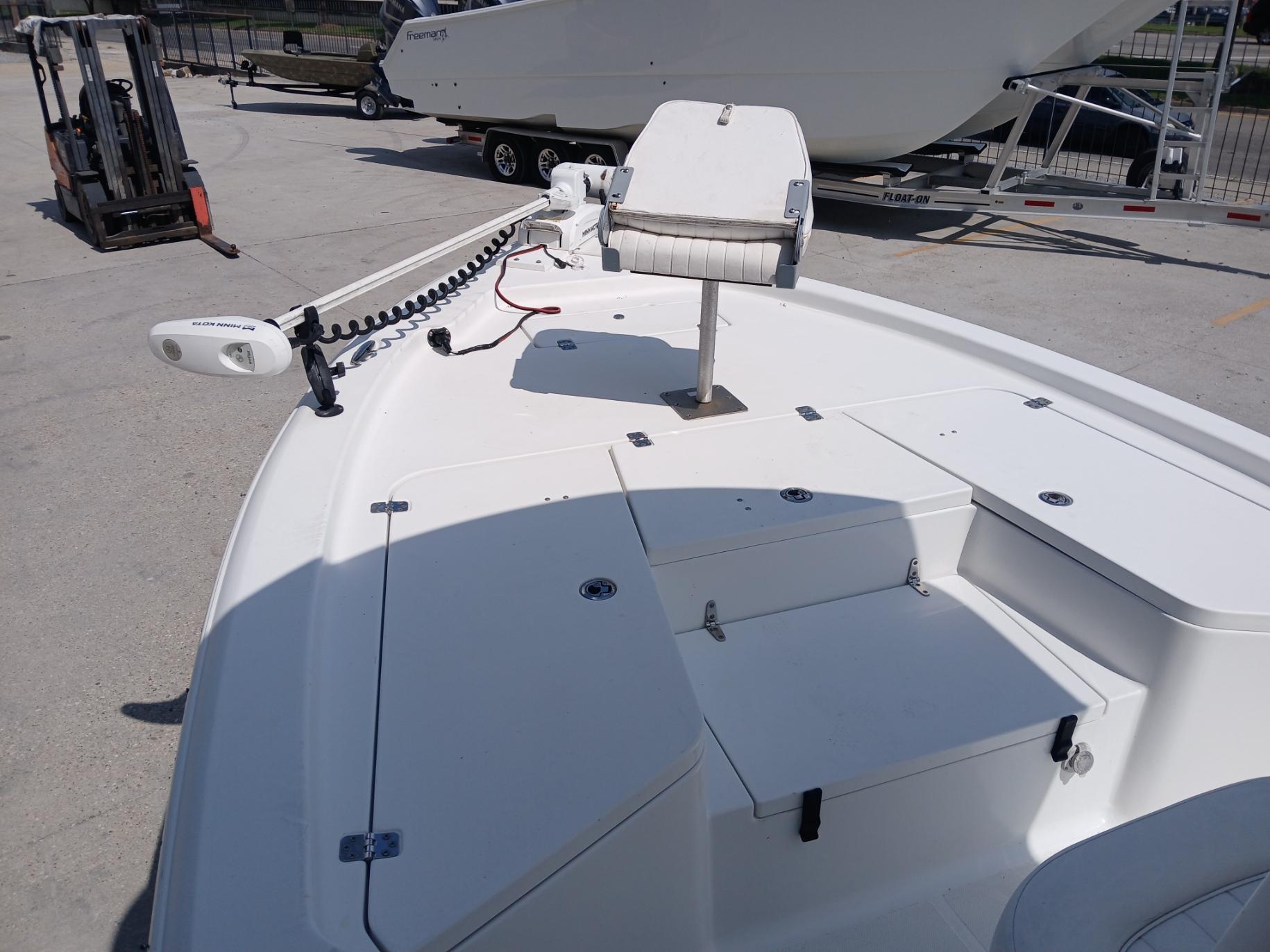 2014 Sea Hunt BX 22 BR boat deck with seating and trolling motor.