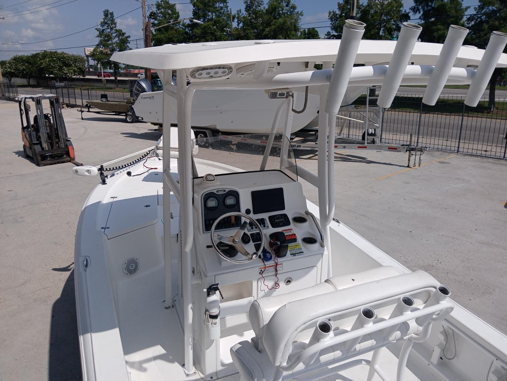 2014 Sea Hunt BX 22 BR boat with center console and rod holders.