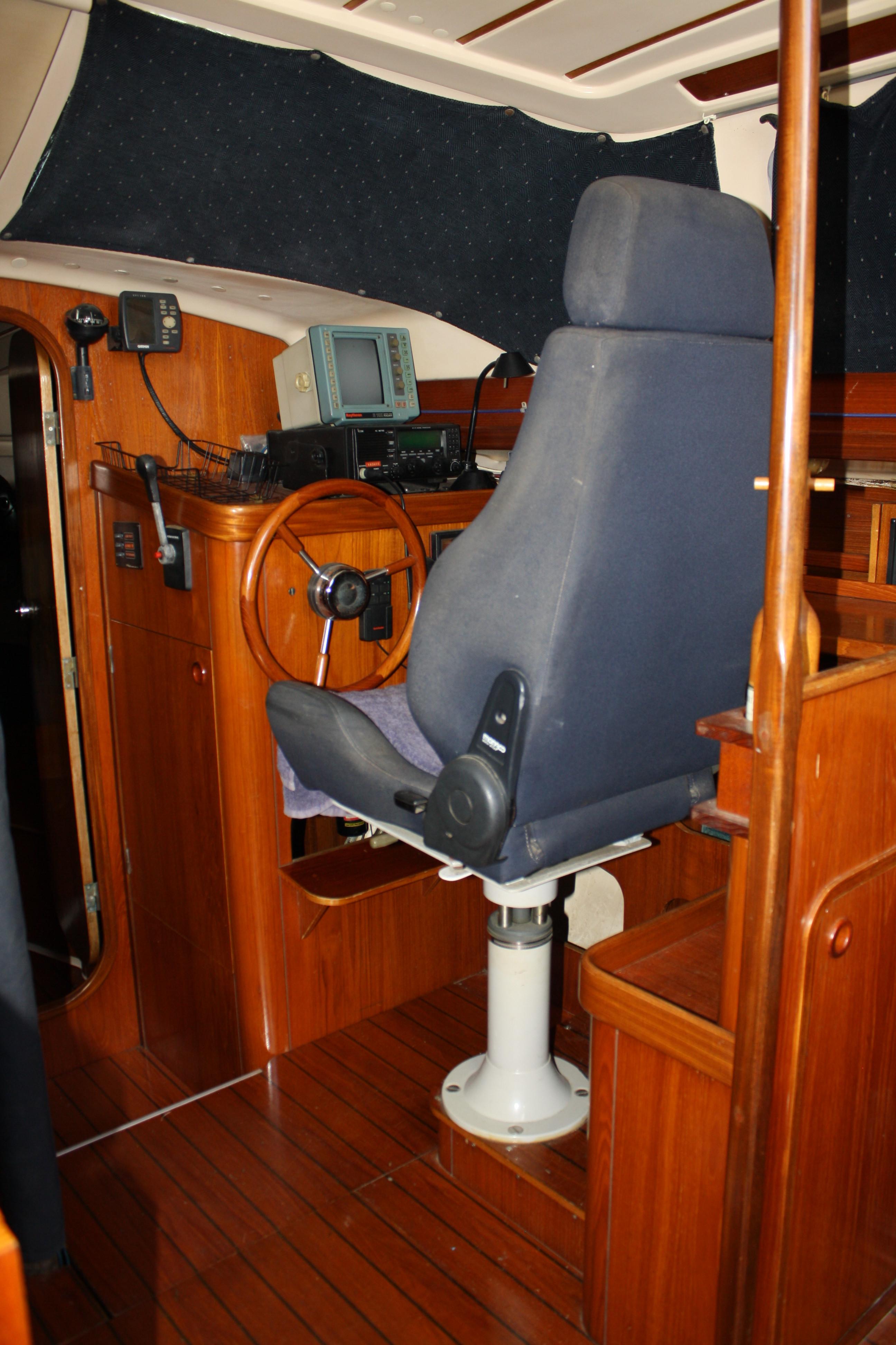 The Recaro style helm seat is not only stable and comfortable, but it raises high enough to put most peoples heads at the headliner for an unobstructed view.