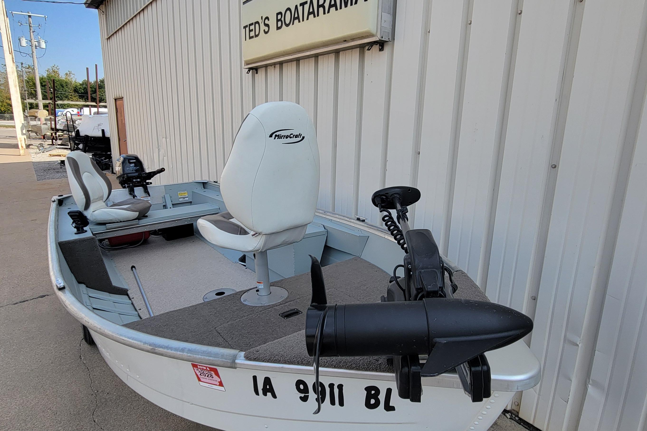 2014 MirroCraft 1400 boat with seating, docked at Ted's Boatarama.