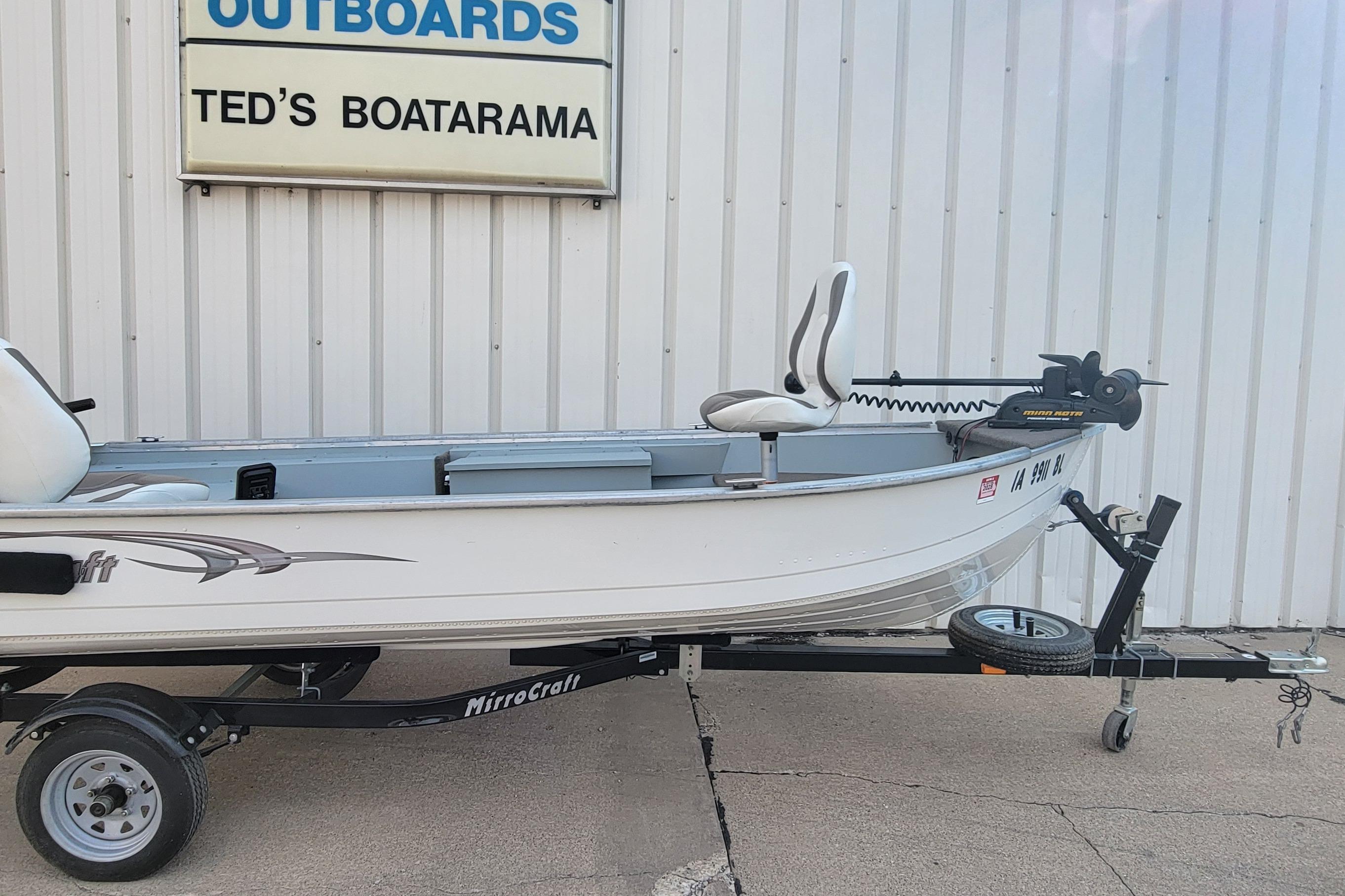 2014 MirroCraft 1400 boat on trailer at Ted's Boatarama dealership.