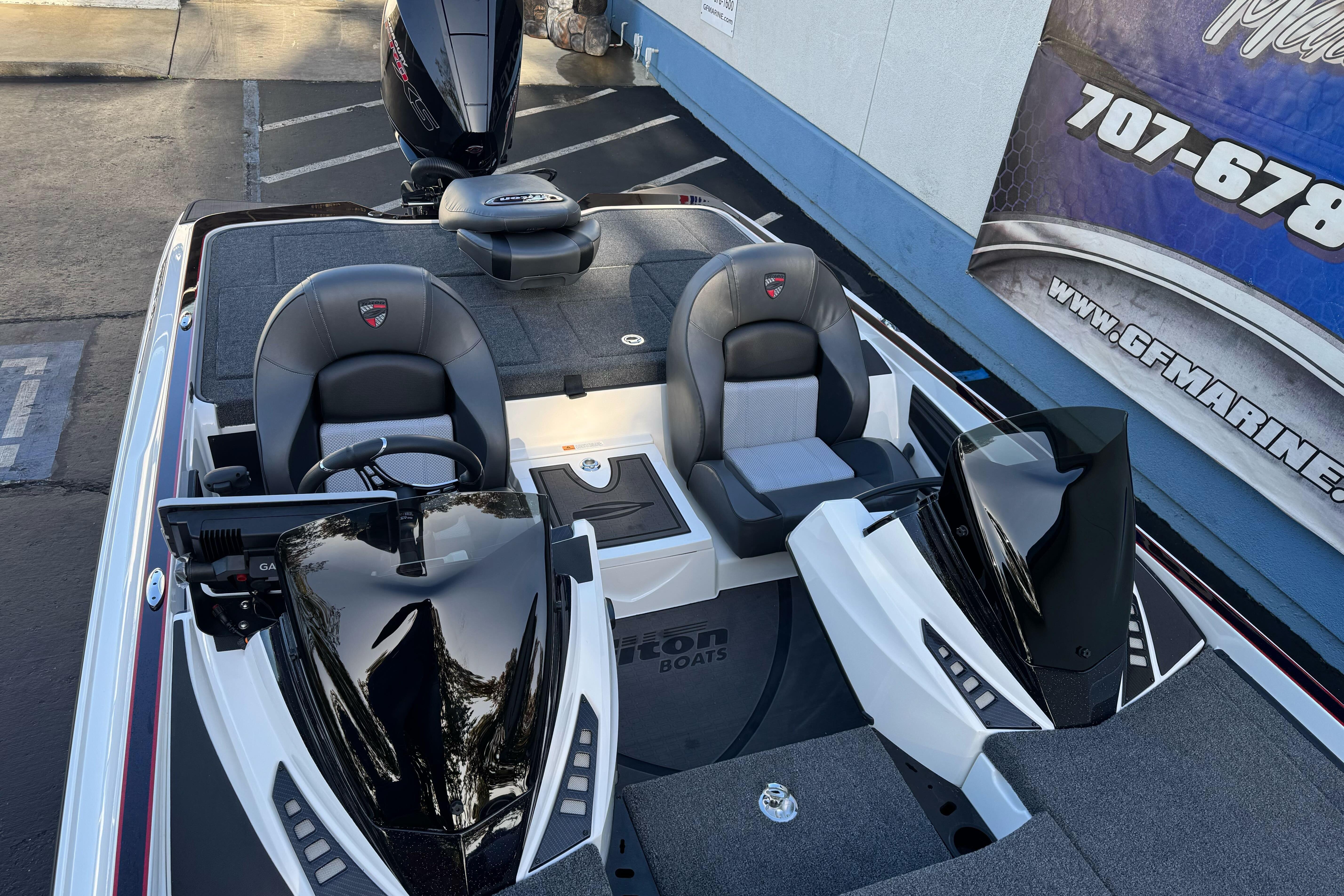 2026 Triton 20XP Patriot boat interior with dual seats and advanced controls.