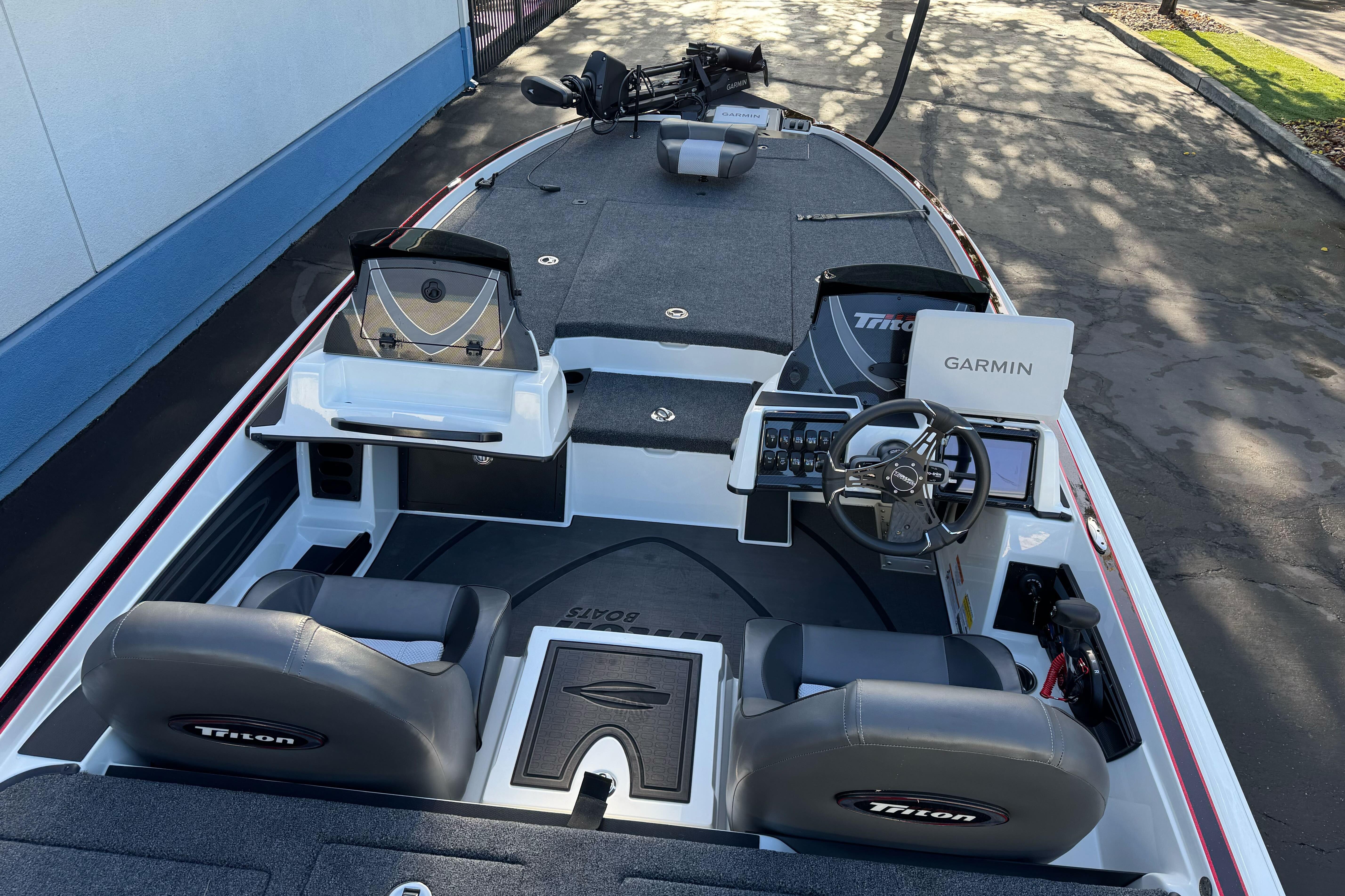 2026 Triton 20XP Patriot boat interior with Garmin navigation system.