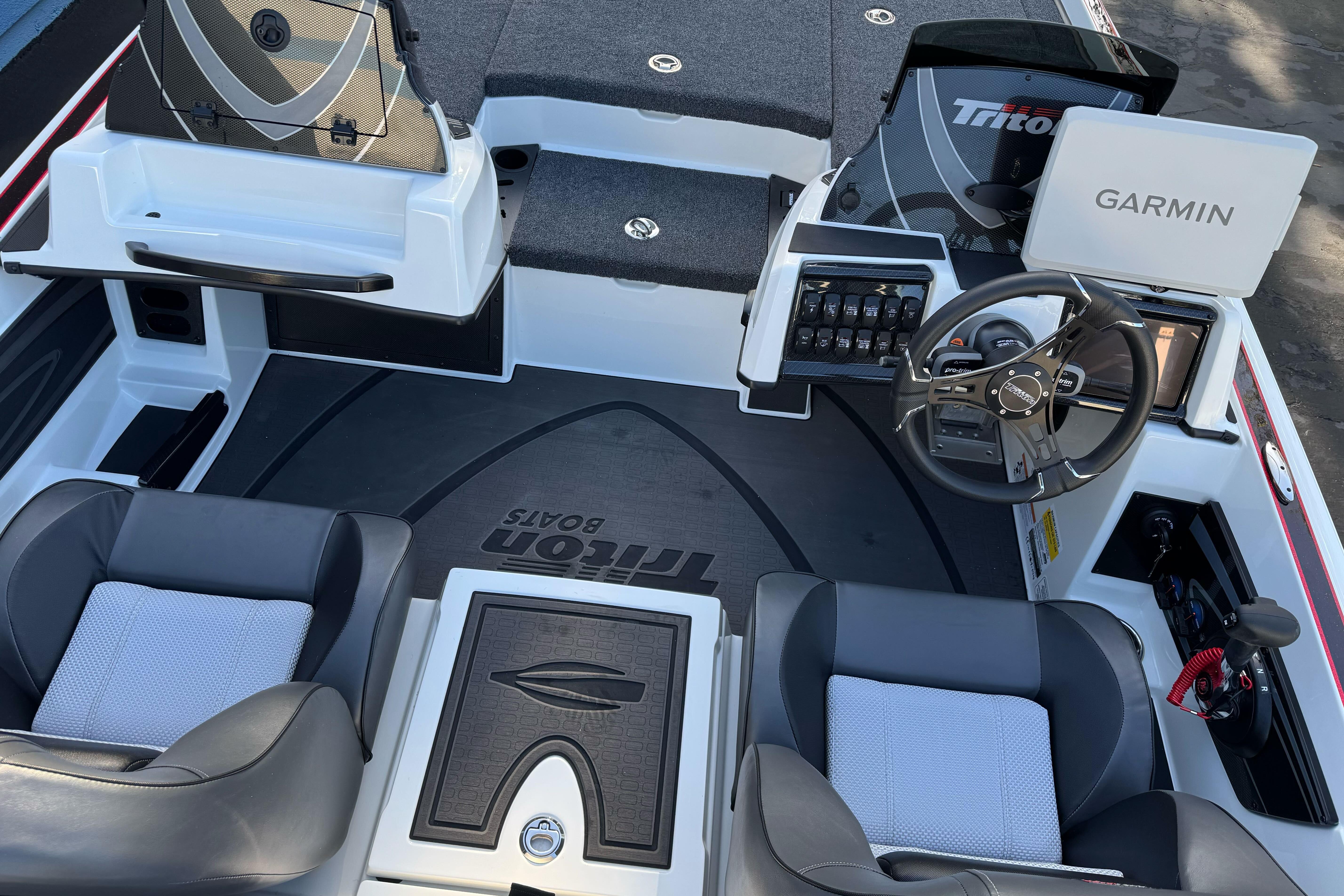 2026 Triton 20XP Patriot boat interior with Garmin navigation and dual seating.