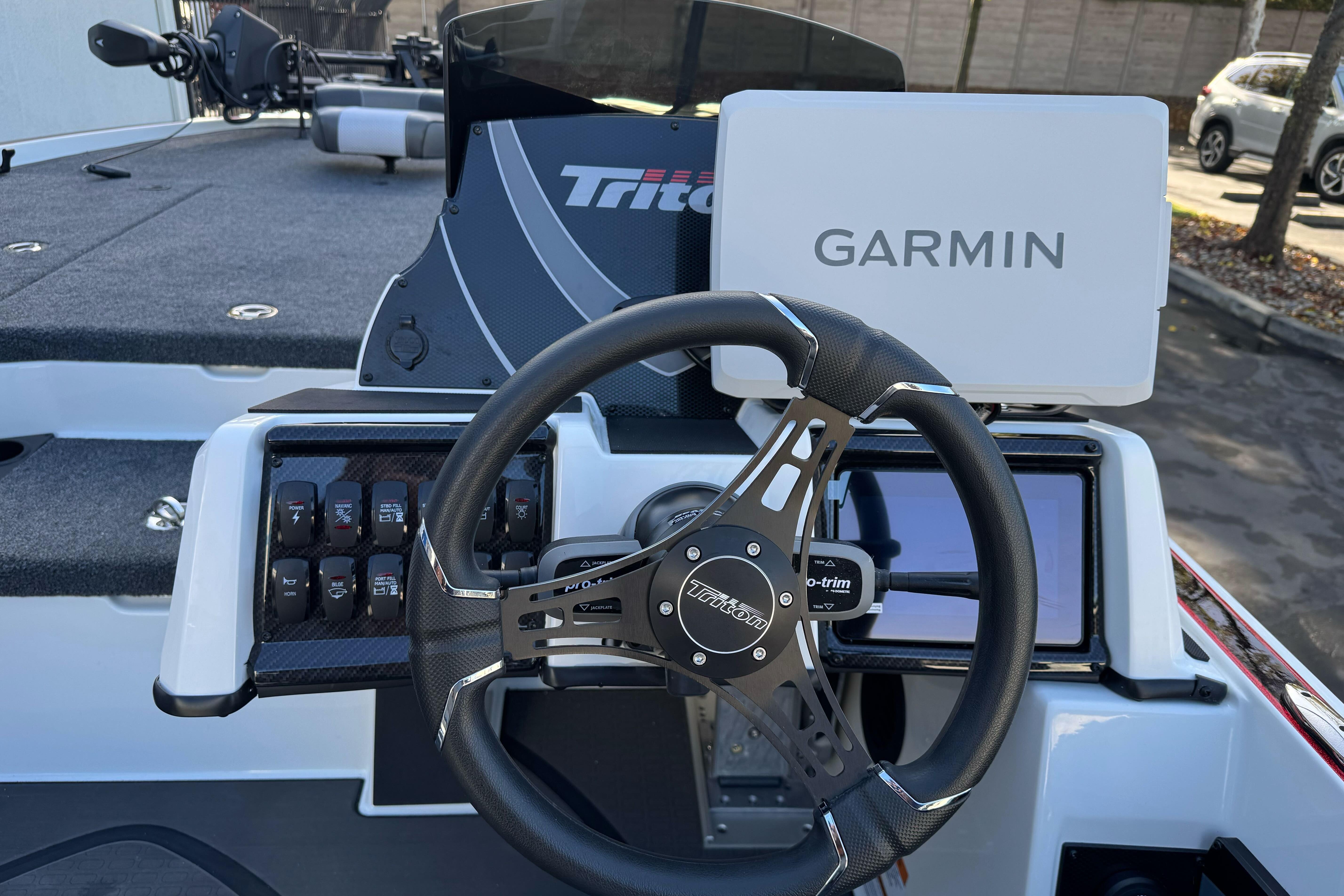 2026 Triton 20XP Patriot boat dashboard with Garmin navigation system.