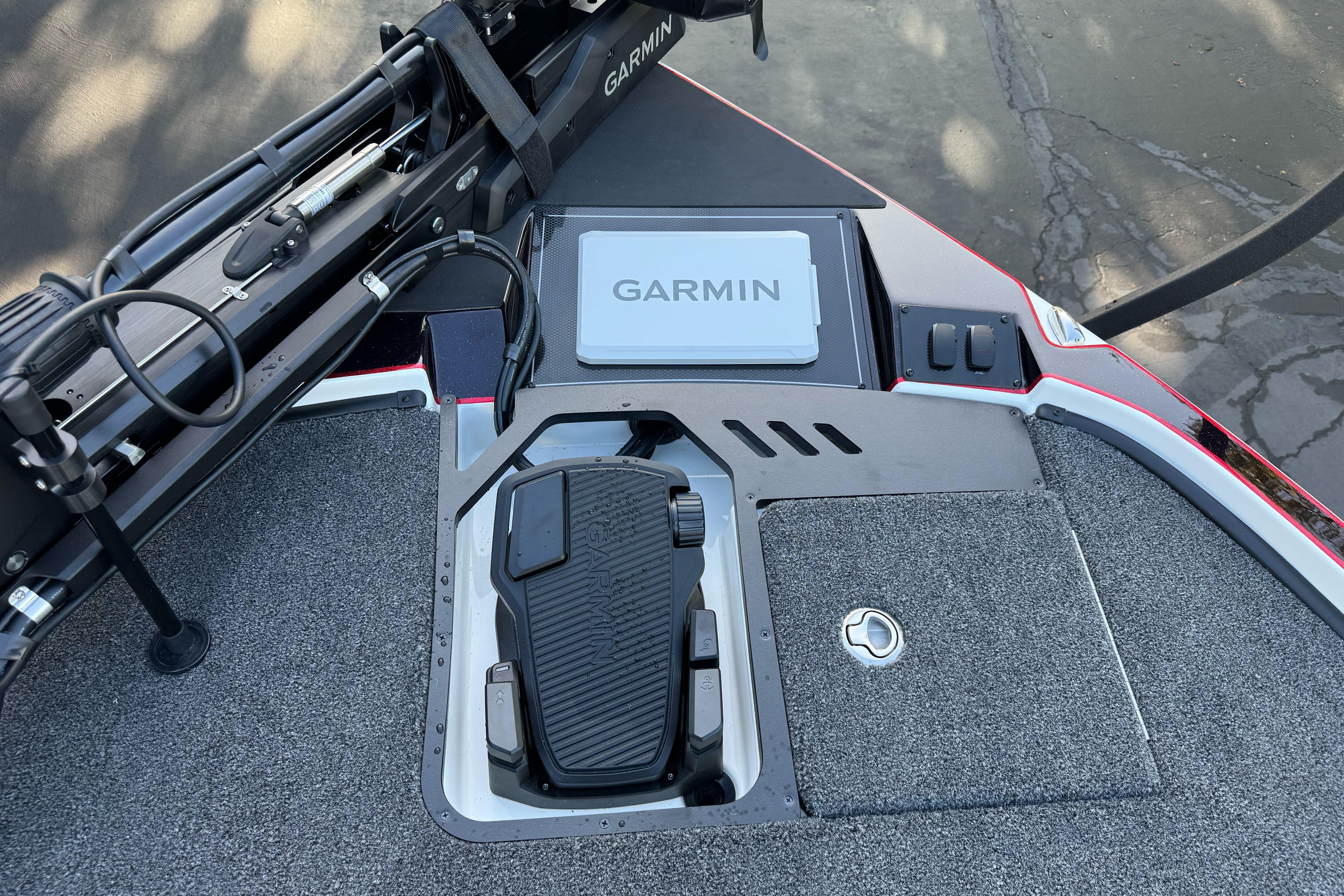 2026 Triton 20XP Patriot boat with Garmin navigation system on deck.