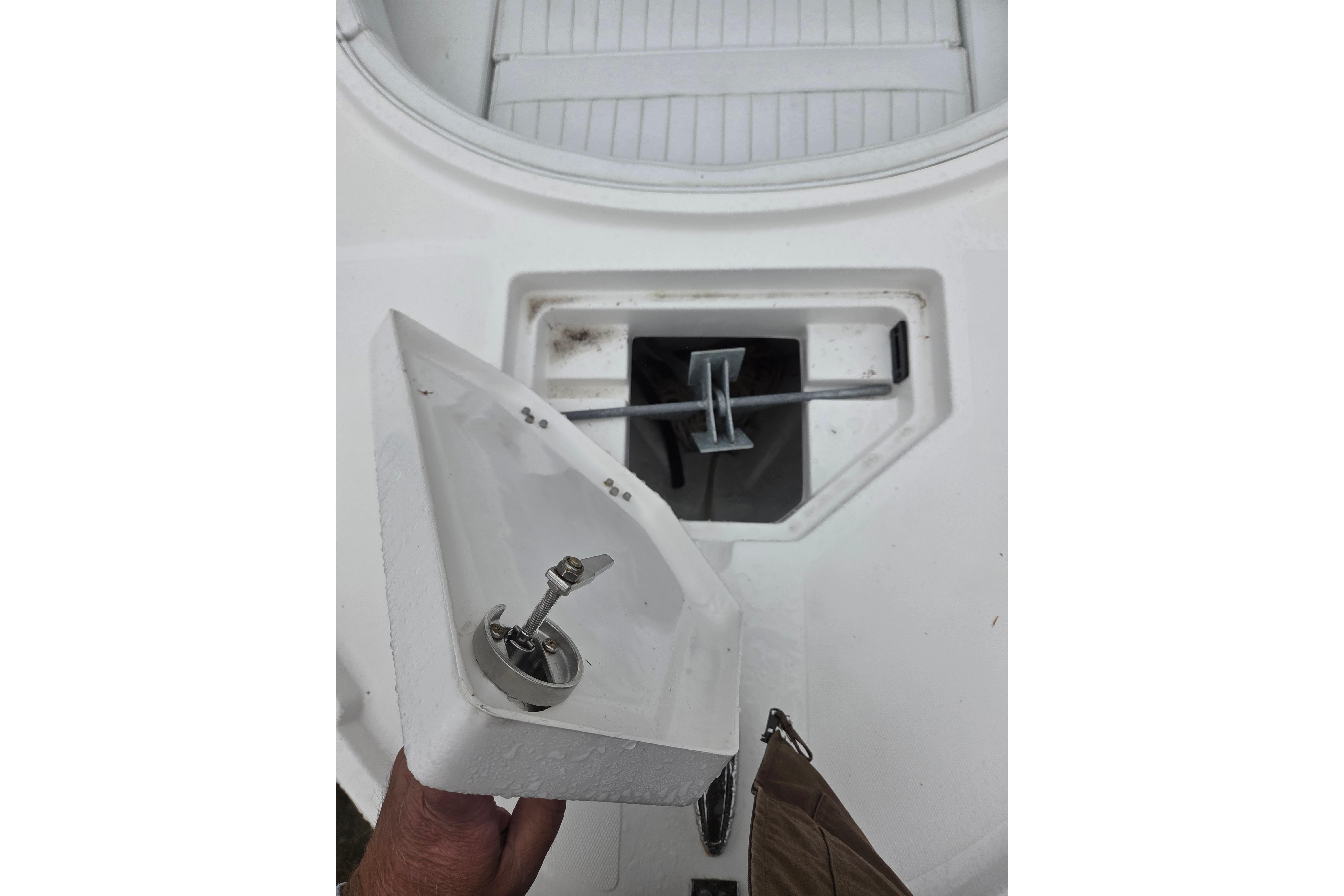 2022 Limestone L200CC boat anchor compartment with open hatch and visible anchor mechanism.