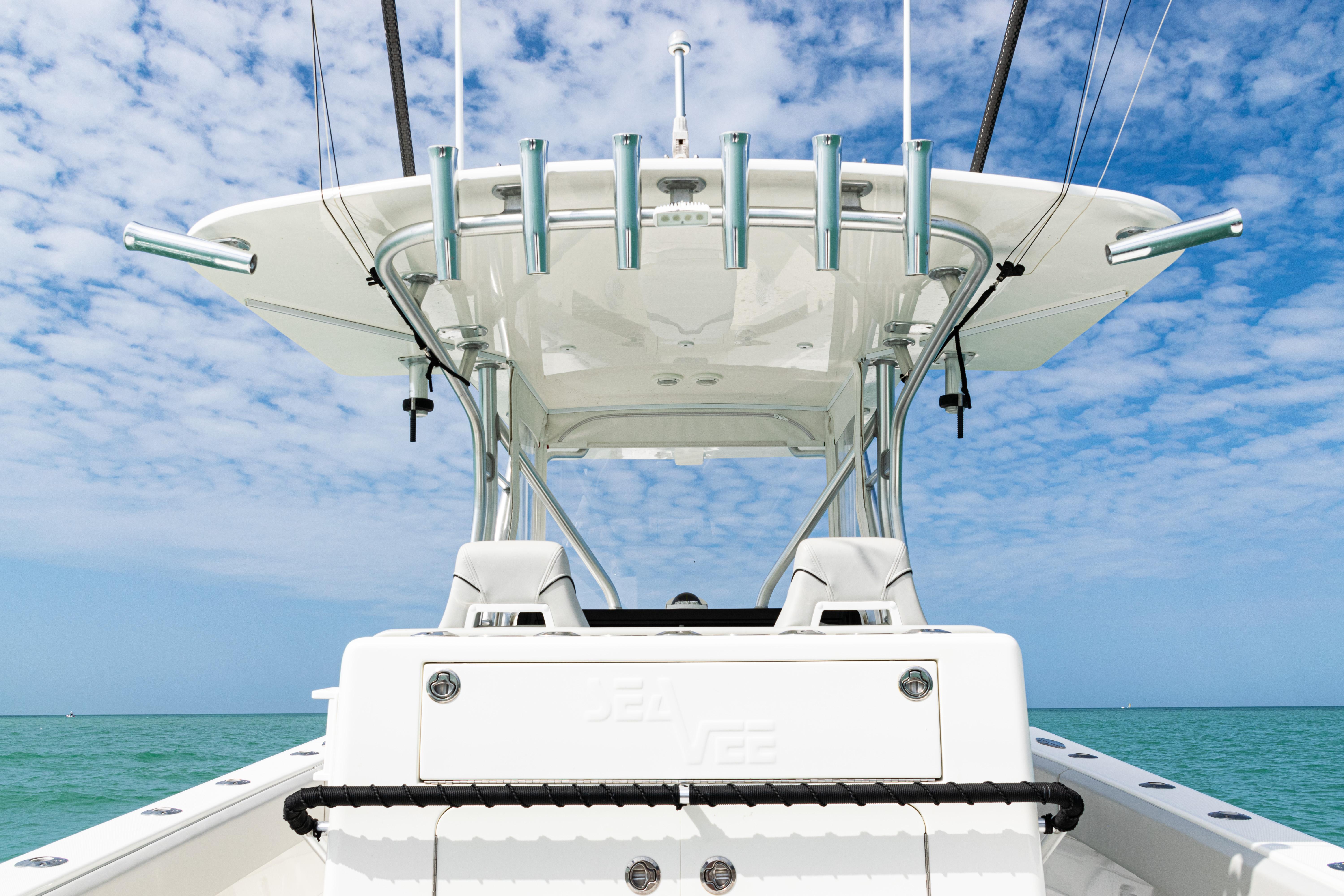 SeaVee-390Z 2015 -FL-US-2015 SeaVee 390Z boat with T-top against a blue sky and ocean backdrop.-9741010 | Thumbnail