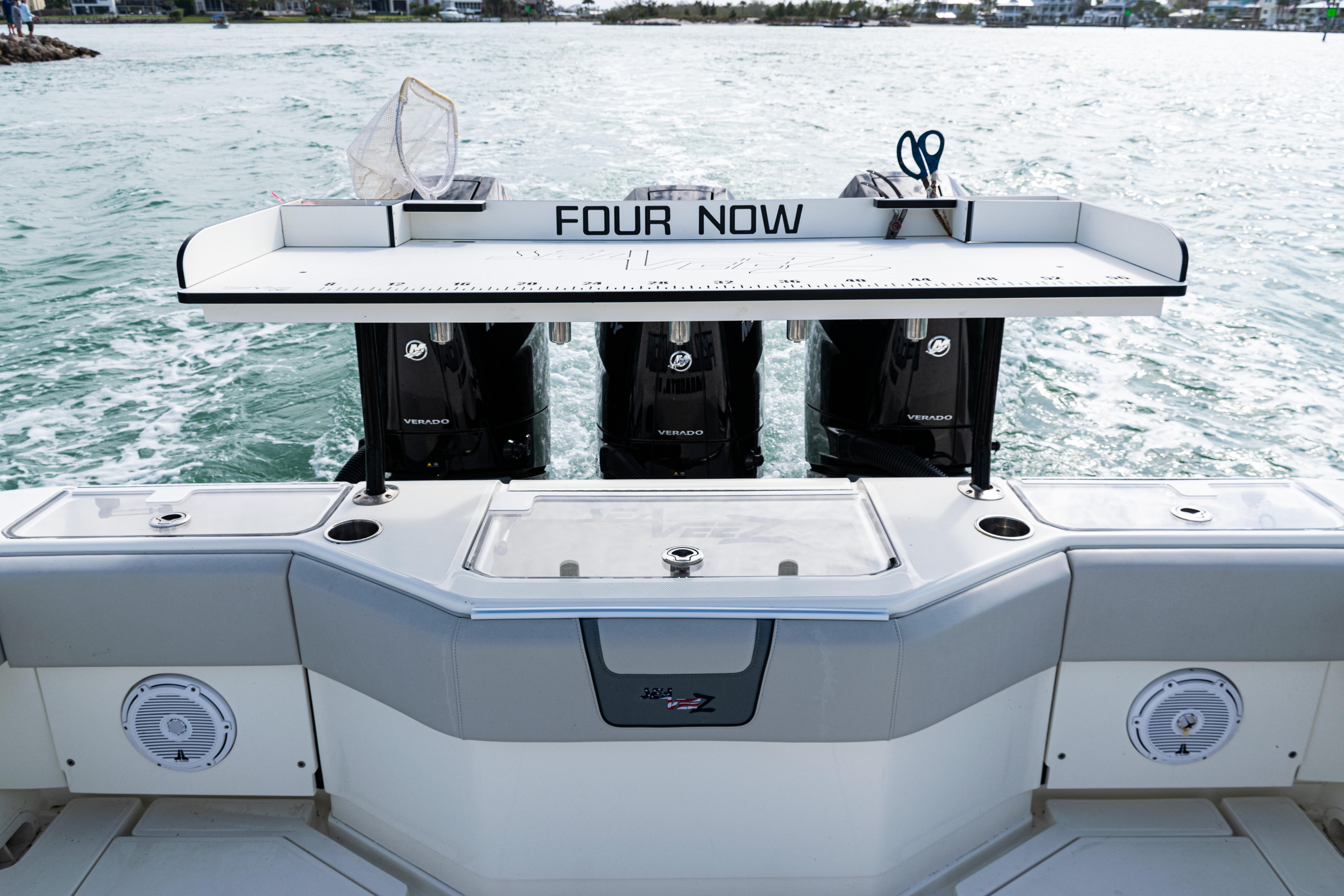 SeaVee-390Z 2015 -FL-US-2015 SeaVee 390Z boat with triple Mercury engines, fishing station, and ocean backdrop.-9741010 | Thumbnail