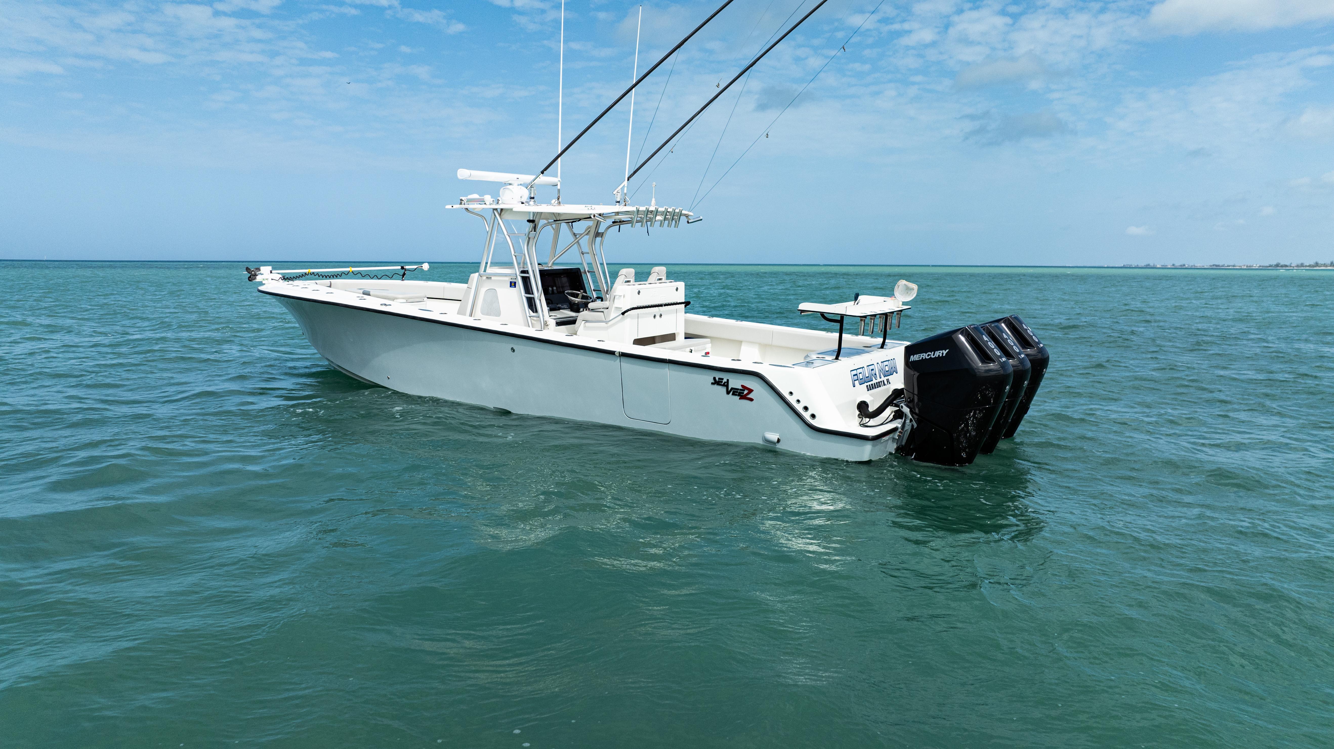 SeaVee-390Z 2015 -FL-US-2015 SeaVee 390Z boat on calm ocean waters under a clear blue sky.-9741010 | Thumbnail