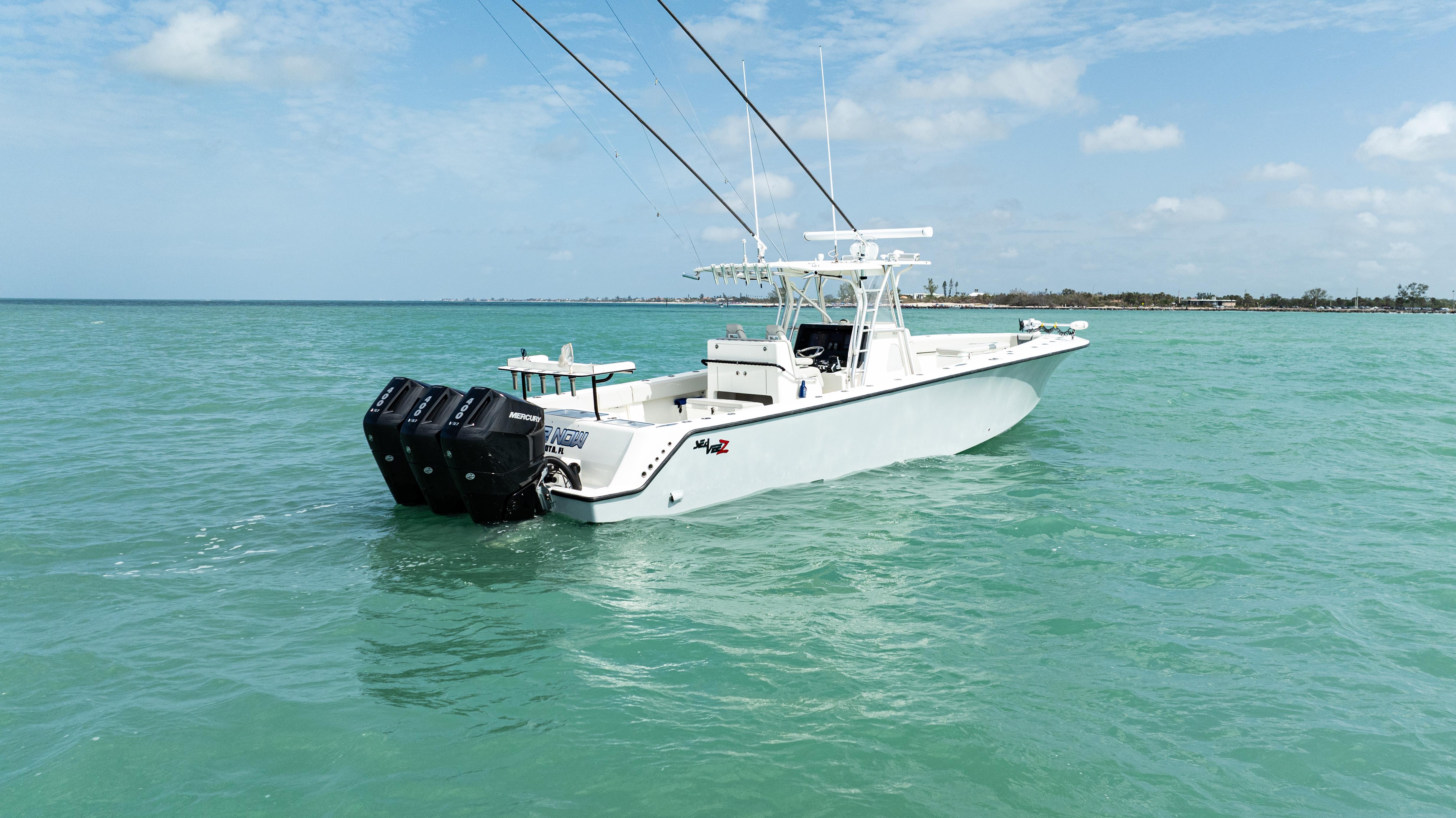 SeaVee-390Z 2015 -FL-US-2015 SeaVee 390Z boat with multiple engines on turquoise water under blue sky.-9741010 | Thumbnail