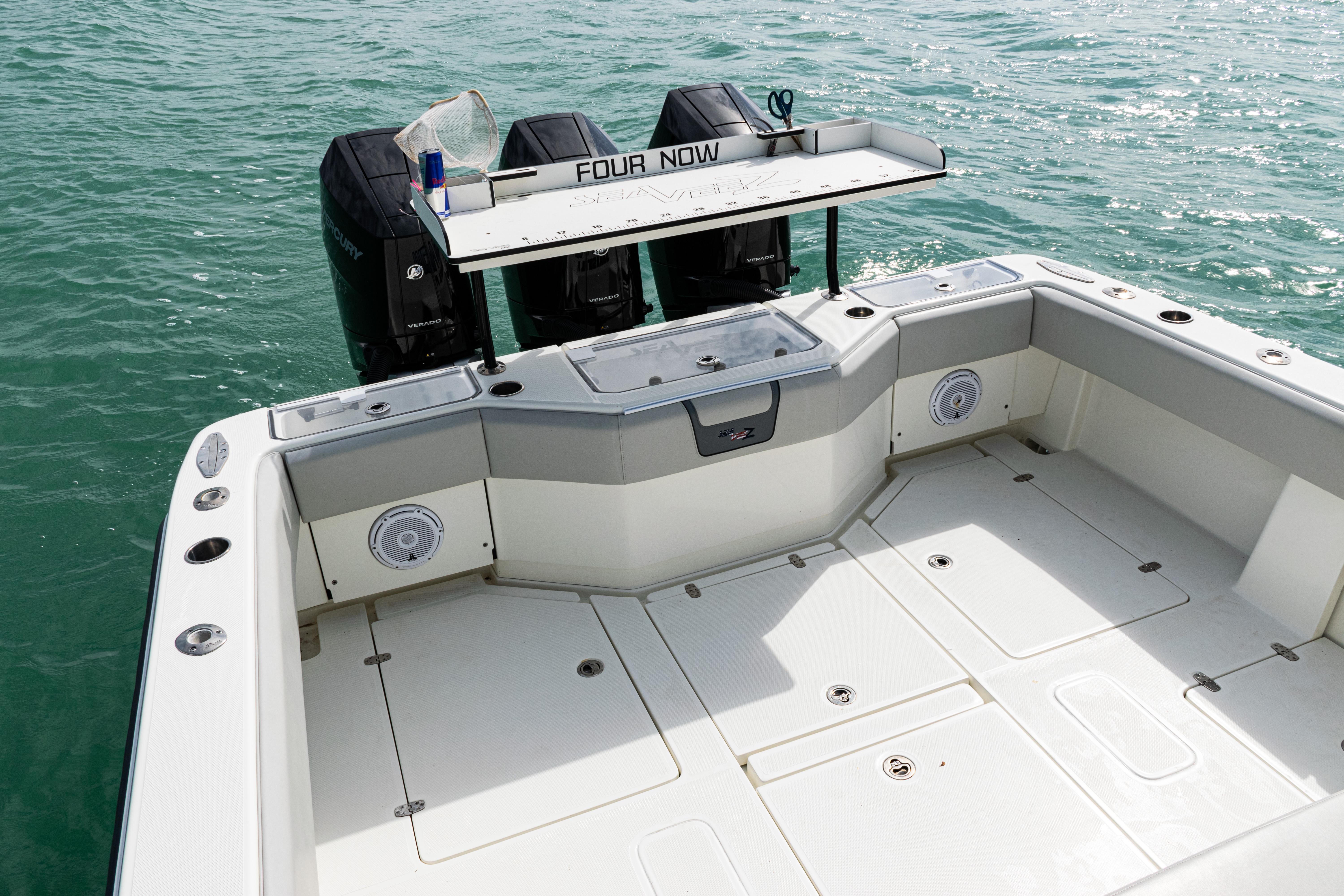 SeaVee-390Z 2015 -FL-US-2015 SeaVee 390Z boat deck with triple outboard motors on water.-9741010 | Thumbnail