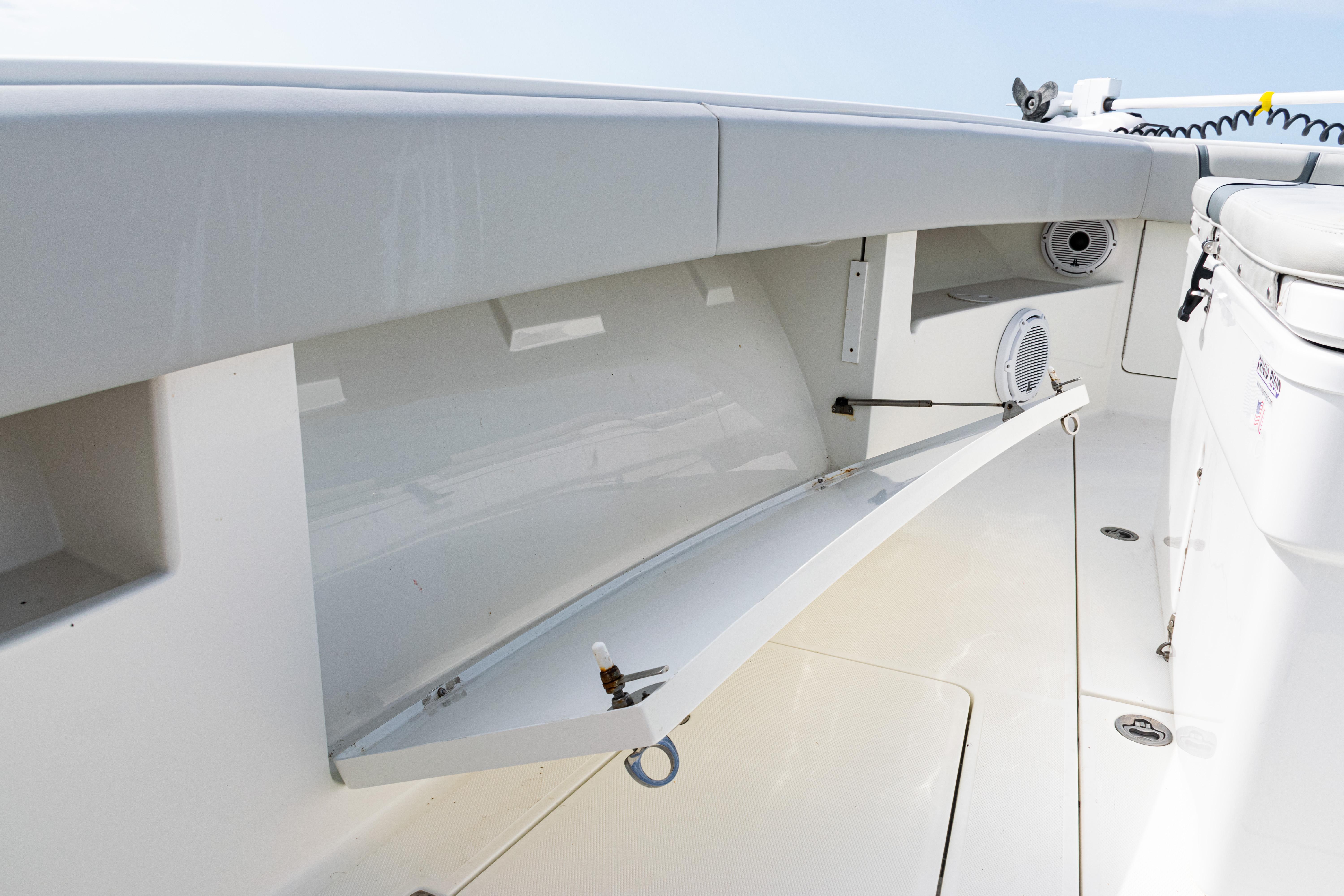 SeaVee-390Z 2015 -FL-US-2015 SeaVee 390Z boat interior storage compartment with open hatch and speaker.-9741010 | Thumbnail
