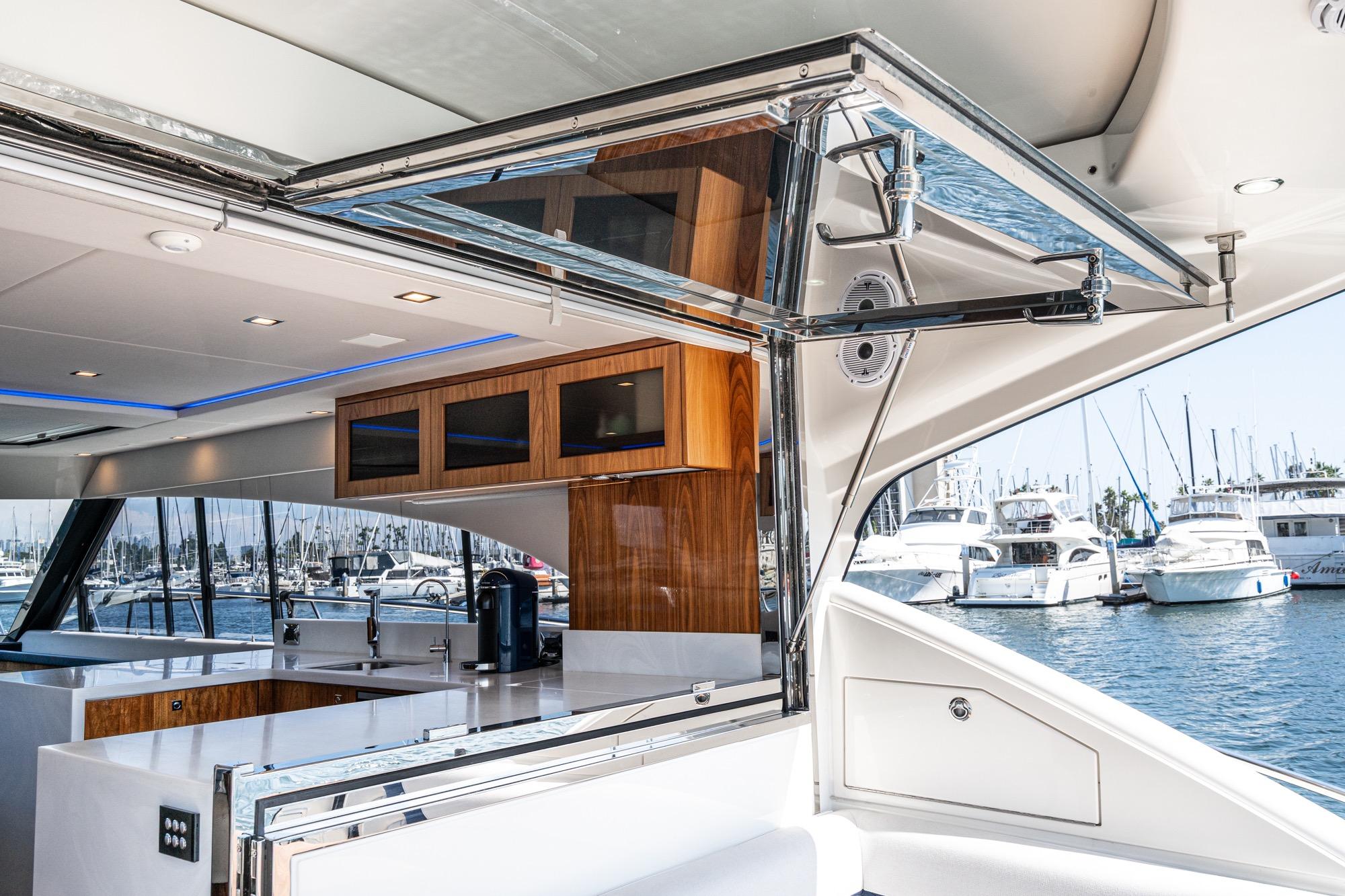 2023 Riviera 5400 Sport Yacht #TBRM54134D-LLC inventory image at Sun Country Marine Group, San Diego Harbor Island