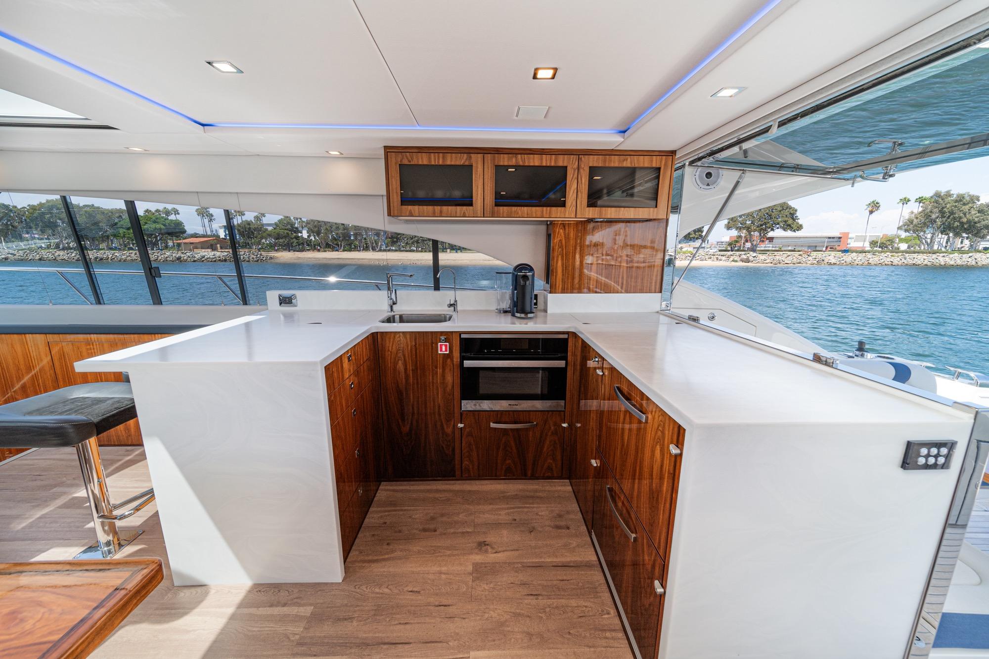 2023 Riviera 5400 Sport Yacht #TBRM54134D-LLC inventory image at Sun Country Marine Group, San Diego Harbor Island