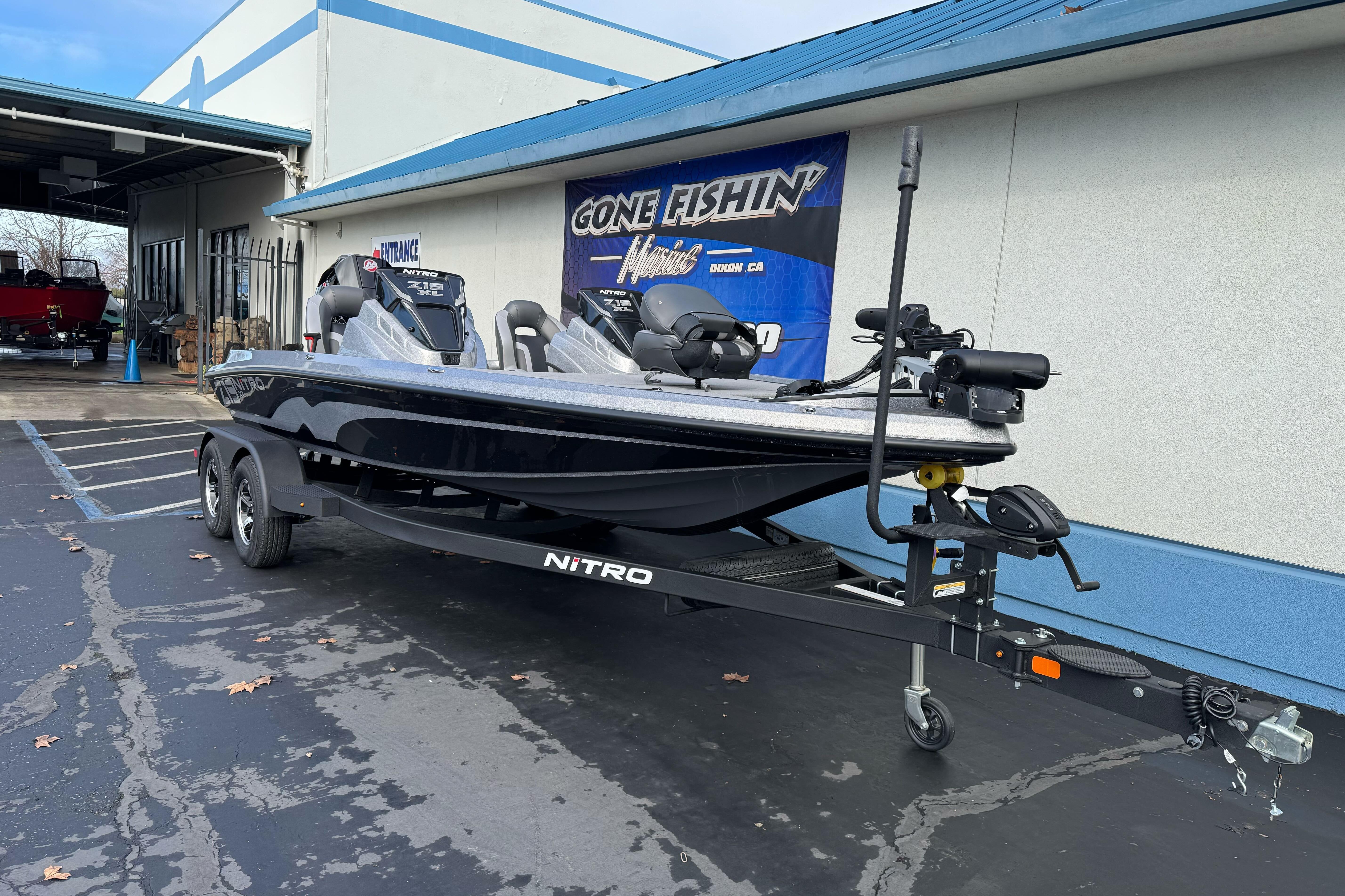 2026 Nitro Z19 XL boat parked outside a dealership, showcasing sleek design and modern features.