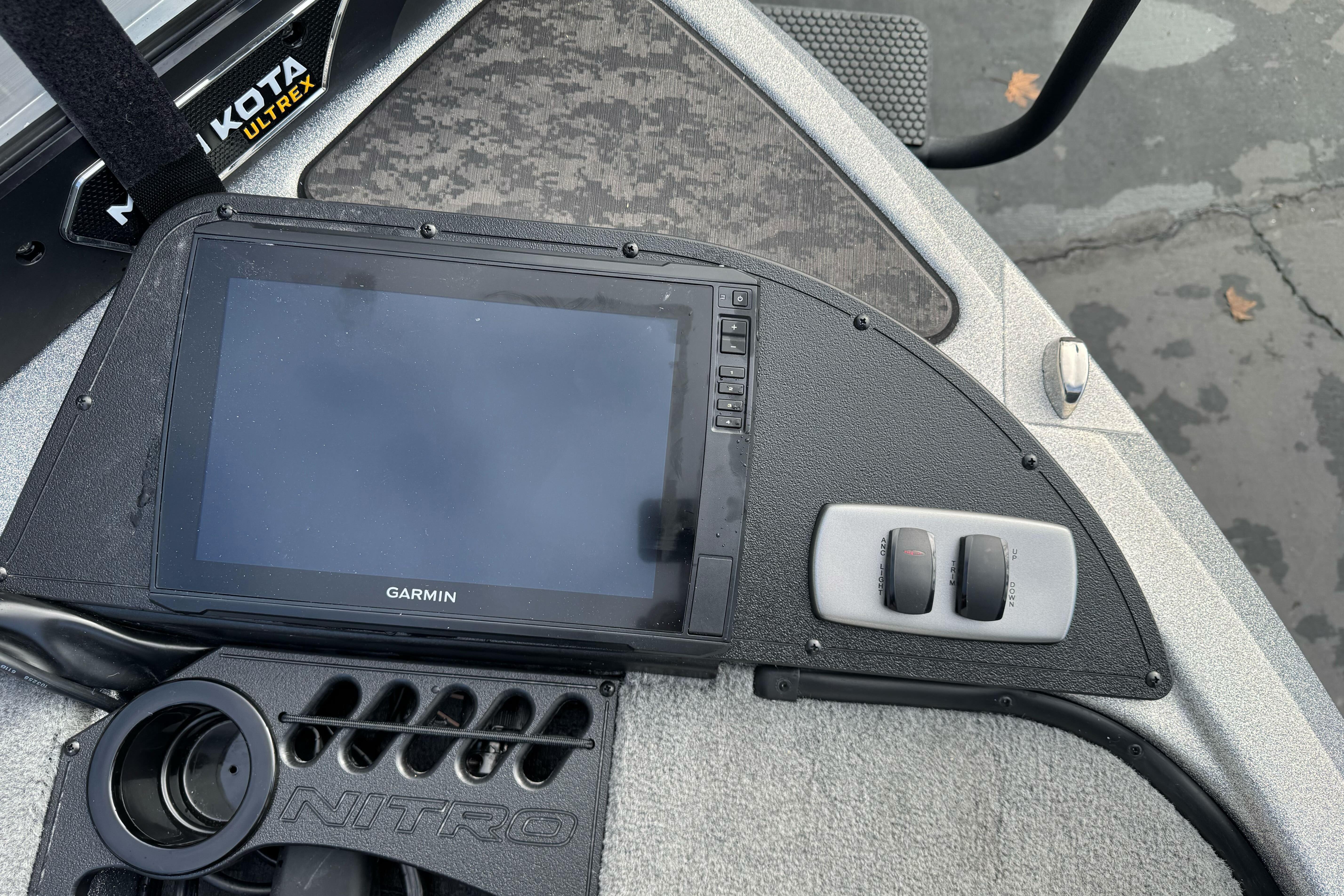 2026 Nitro Z19 XL boat dashboard with Garmin display and controls.