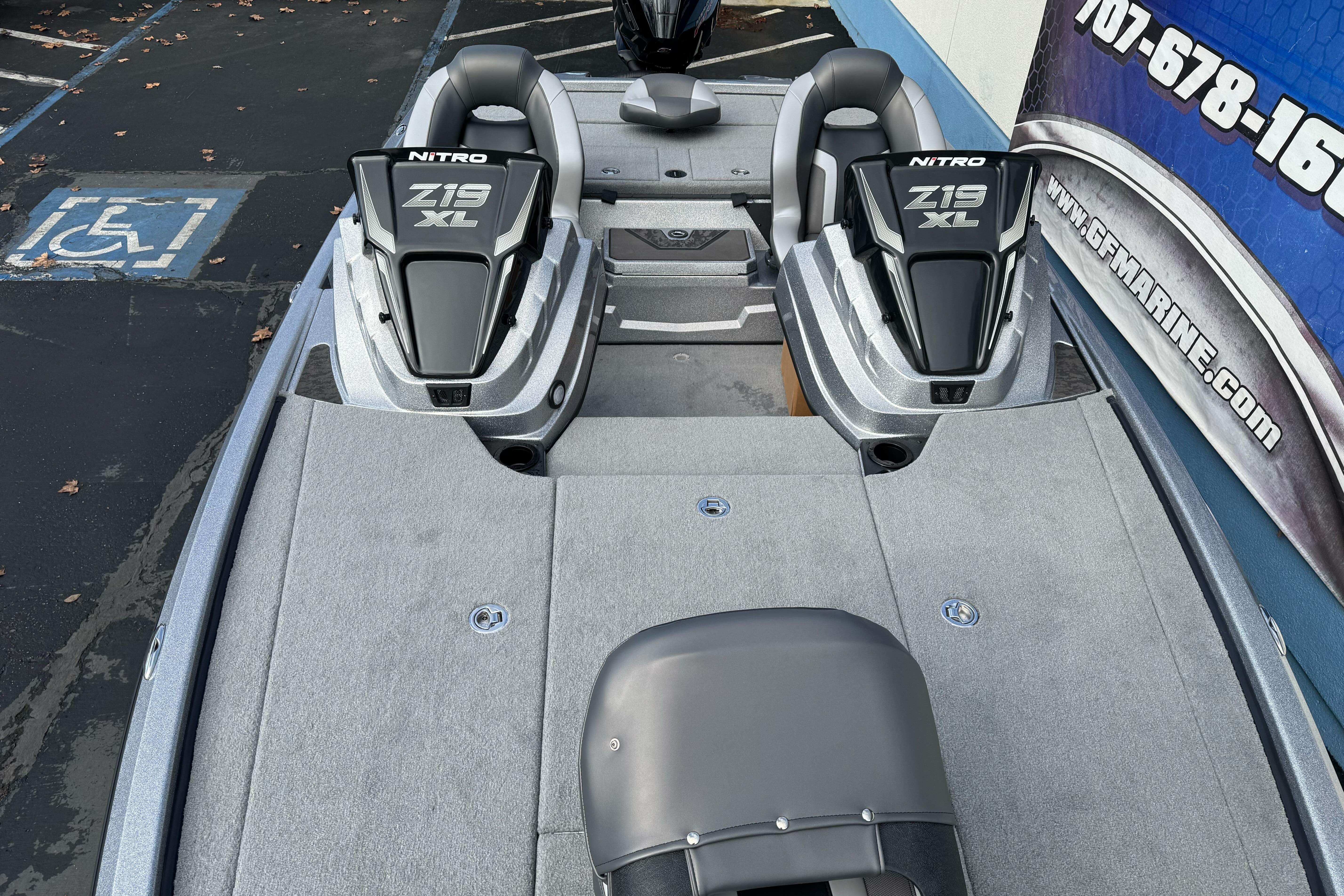 2026 Nitro Z19 XL boat interior with dual seats and carpeted deck.