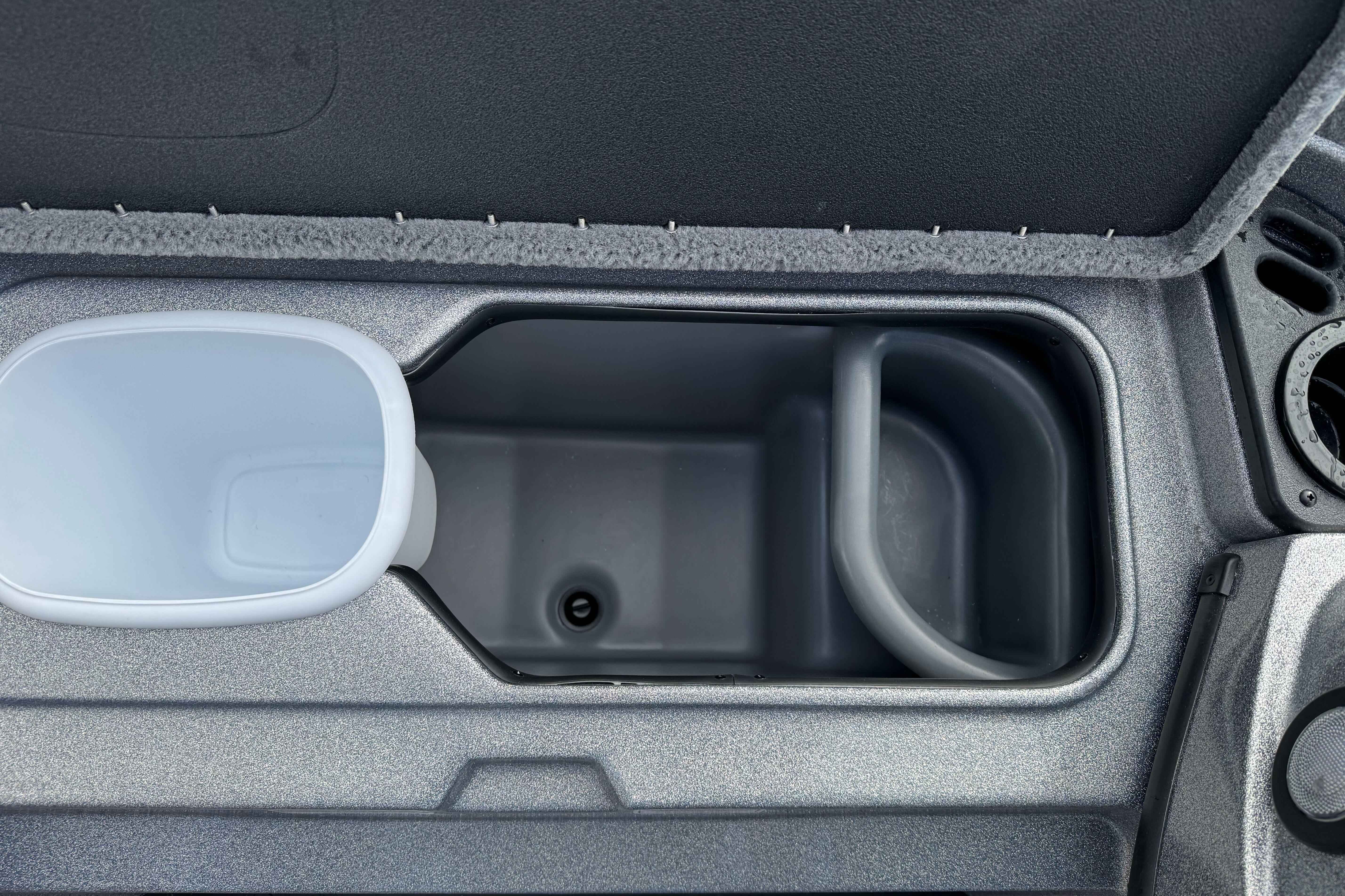 Interior storage compartment of 2026 Nitro Z19 XL boat, featuring a sleek design.