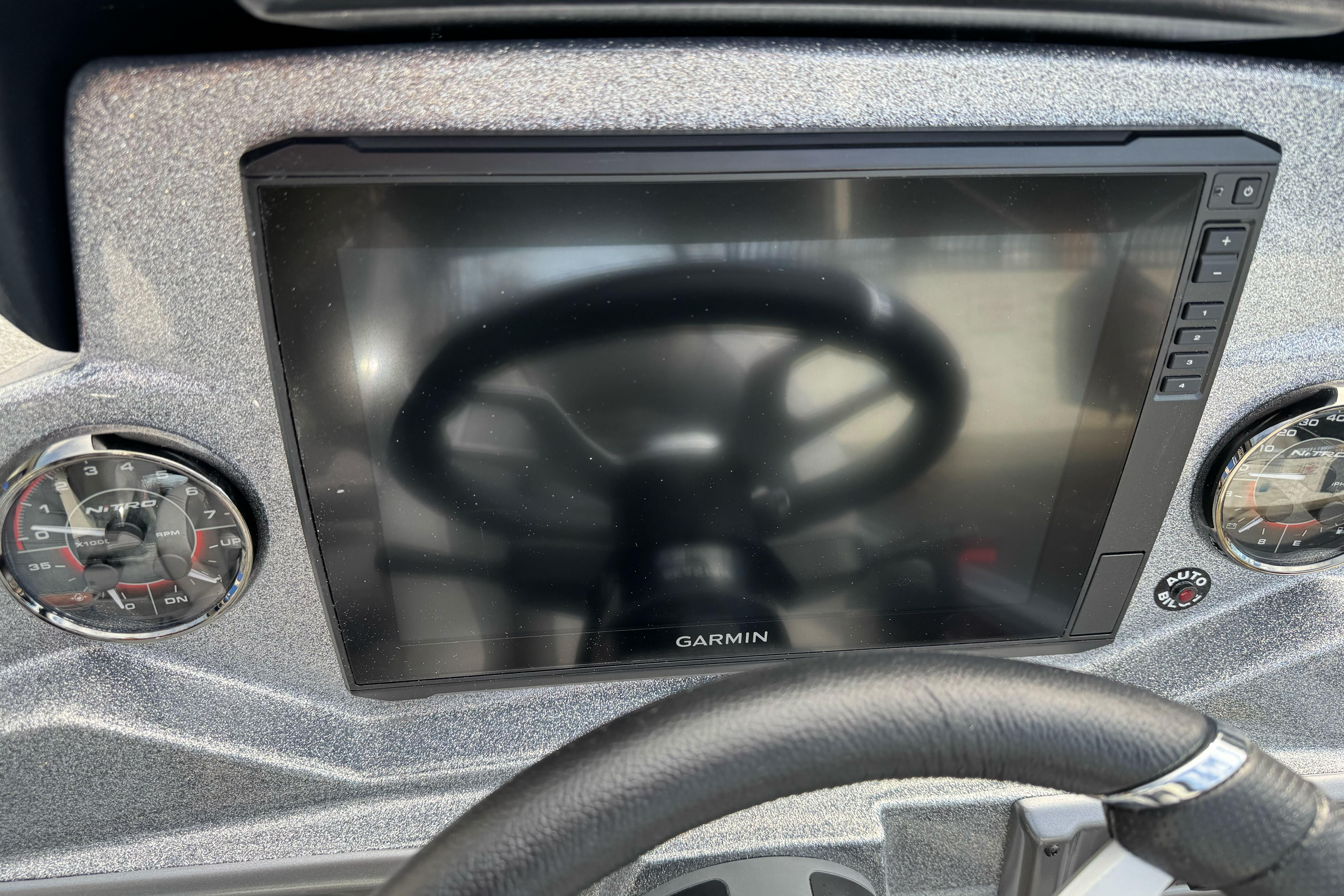 Dashboard of 2026 Nitro Z19 XL boat with Garmin display and gauges.