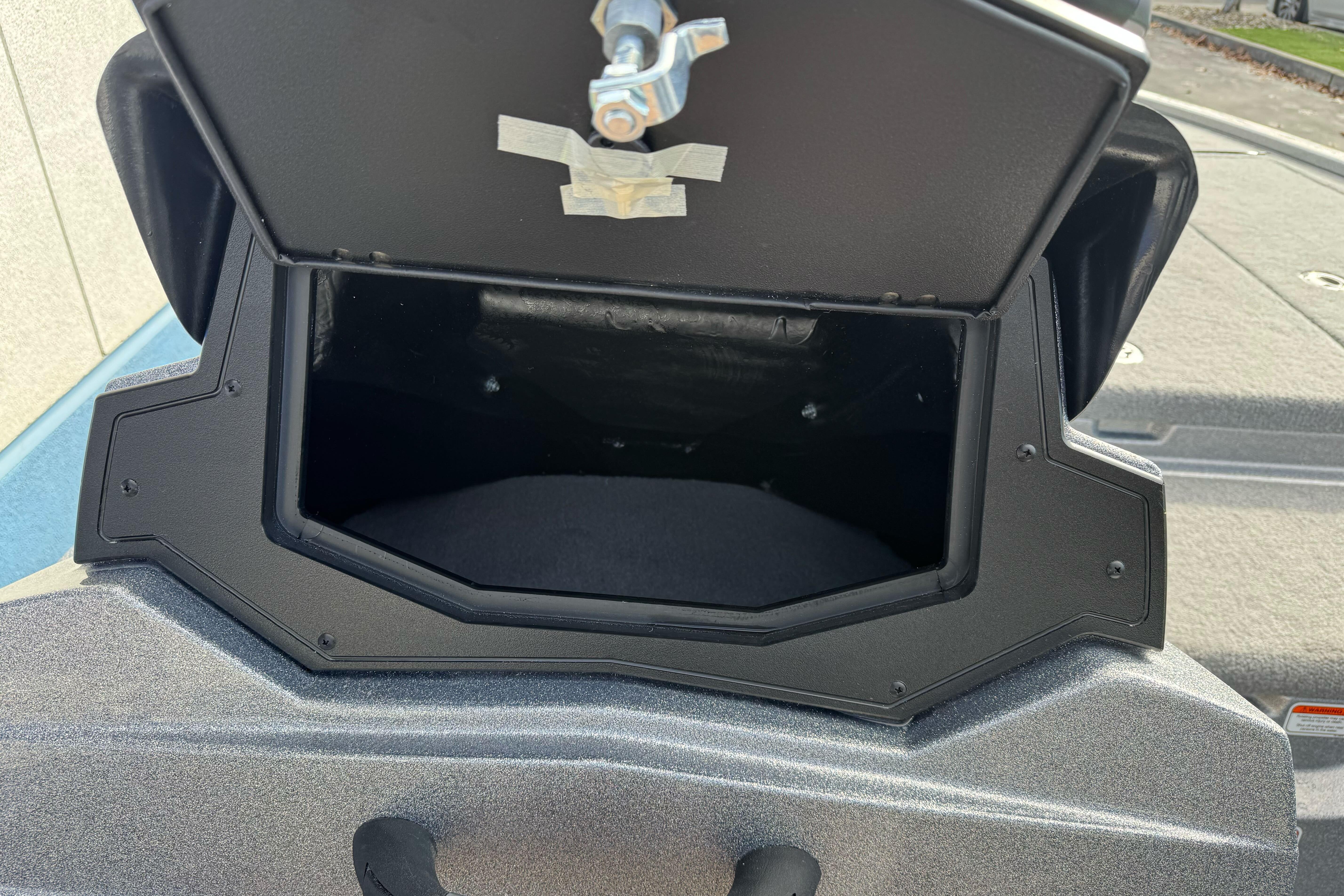 Open storage compartment on 2026 Nitro Z19 XL boat.