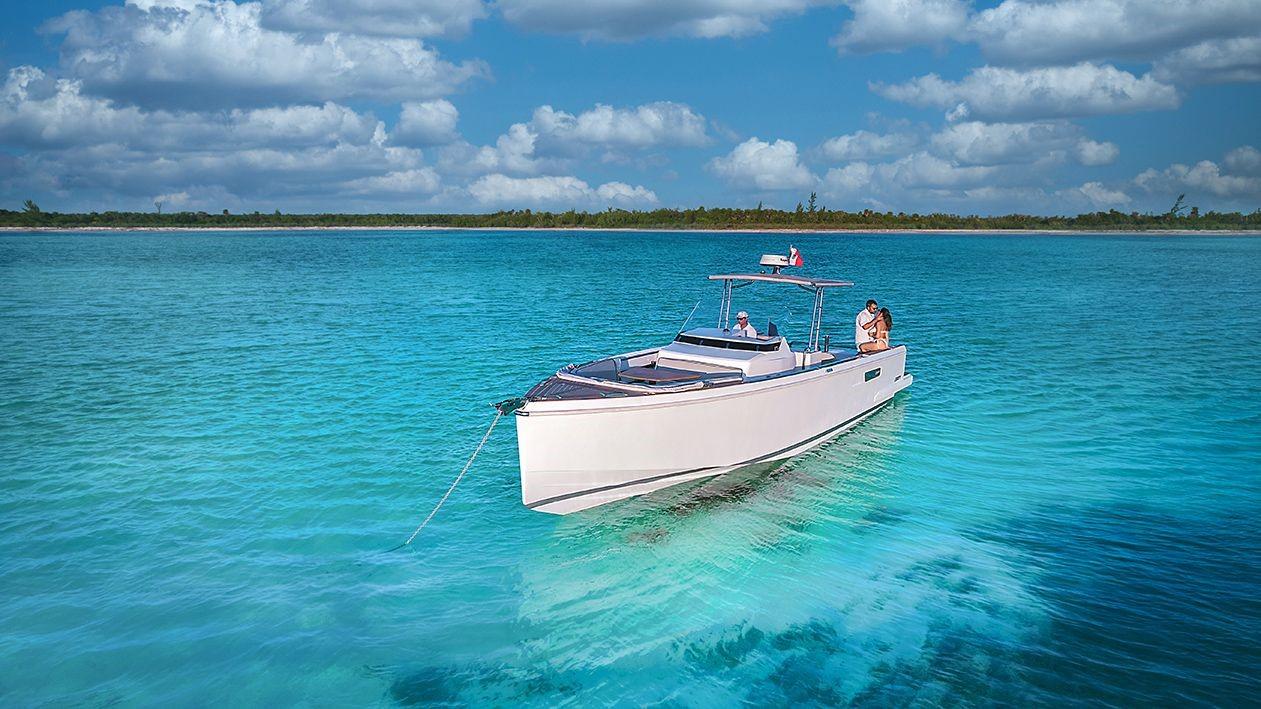 Fjord-36 Open 2018 -FL-US-2018 Fjord 36 Open boat anchored in clear turquoise water under a blue sky.-9391029 | Thumbnail