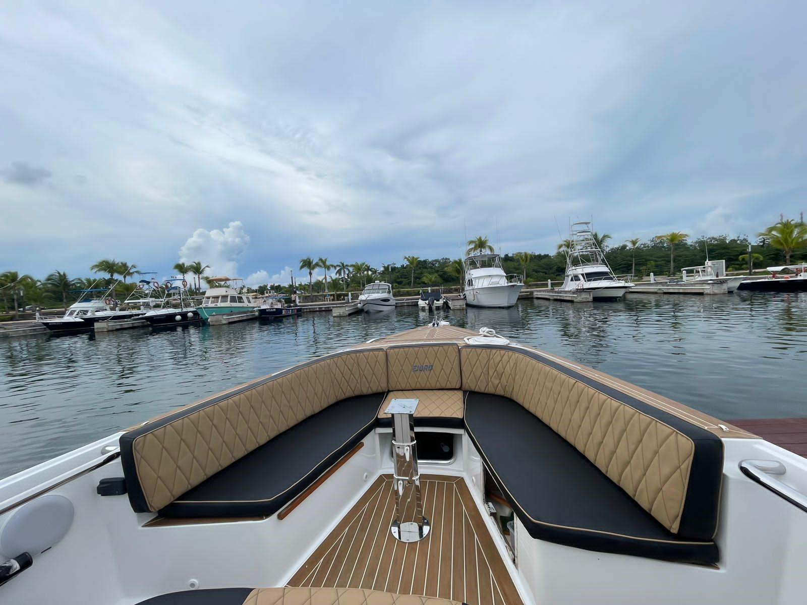 Fjord-36 Open 2018 -FL-US-2018 Fjord 36 Open boat docked at a marina with other boats.-9391029 | Thumbnail