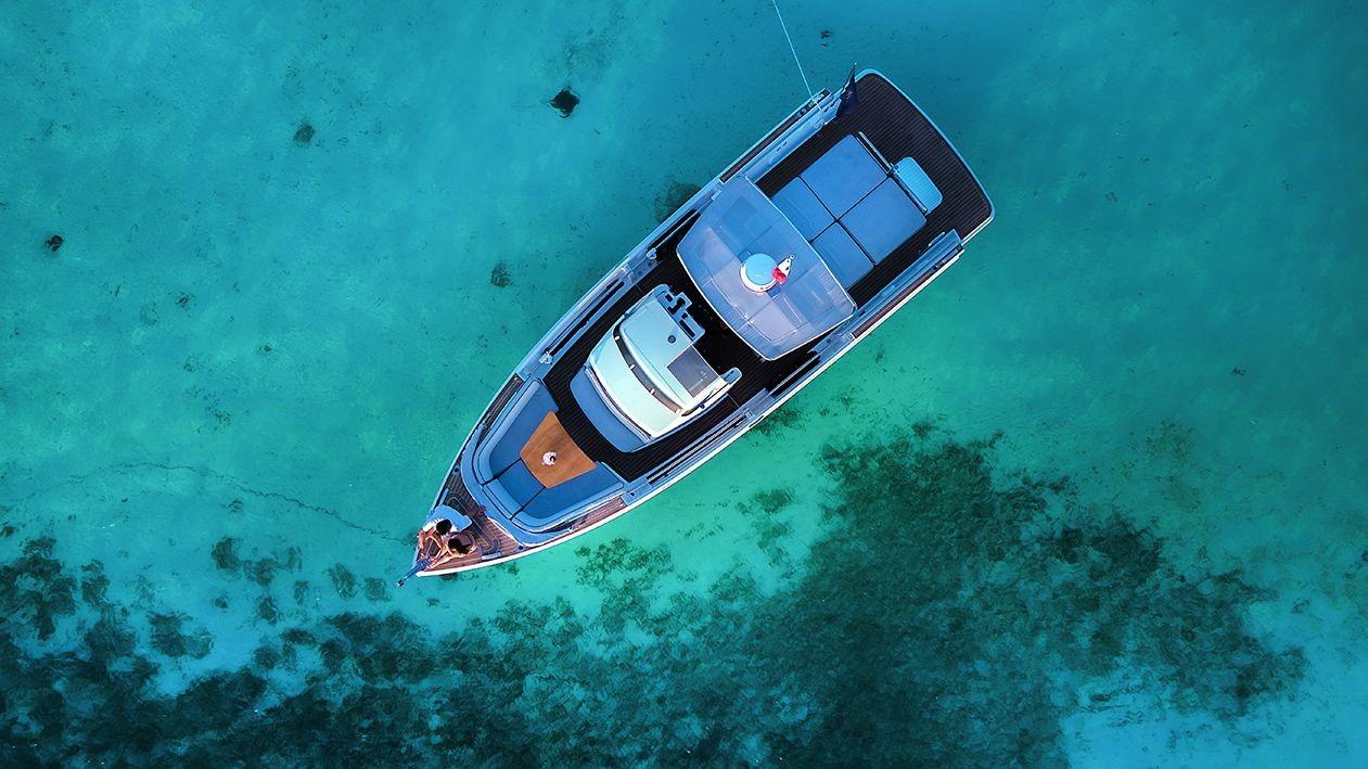 Fjord-36 Open 2018 -FL-US-Aerial view of a 2018 Fjord 36 Open boat in clear turquoise water.-9391029 | Thumbnail