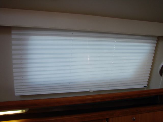 Interior of 2007 Hunter 44 Deck Salon with blinds.