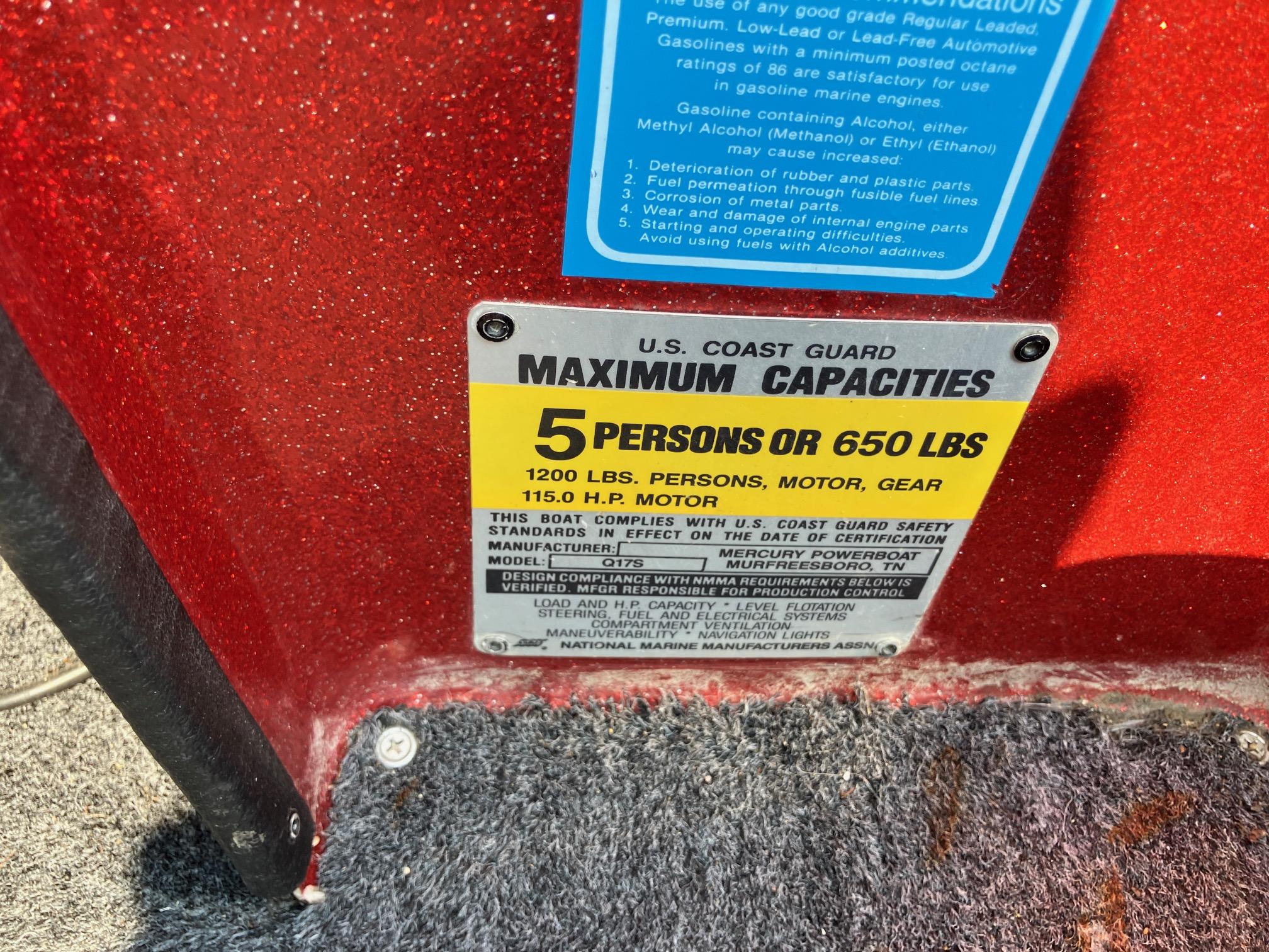 1990 Astro 17 1/2' Bass Boat capacity label, 5 persons or 650 lbs limit.