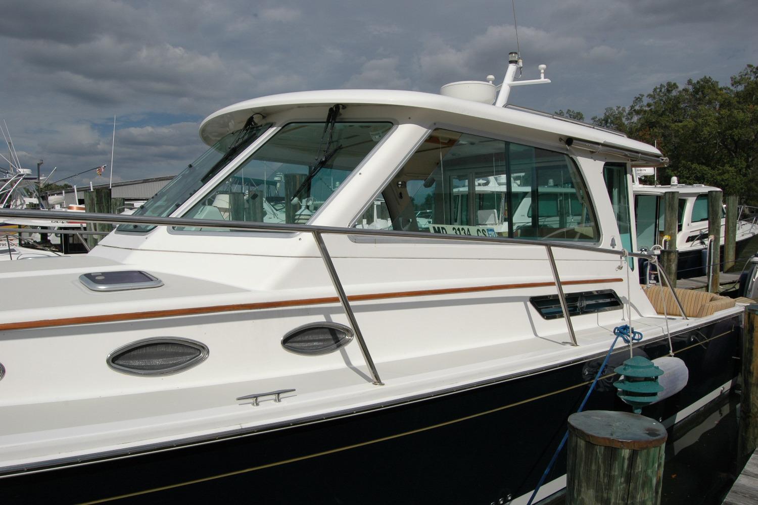 2014 Back Cove 34 boat docked, showcasing sleek design and modern features.