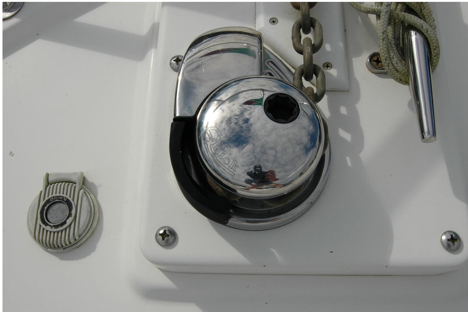 Chrome winch and chain on 2014 Back Cove 34 boat deck.
