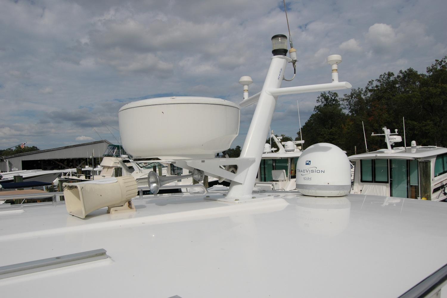 2014 Back Cove 34 yacht with radar and communication equipment on deck.