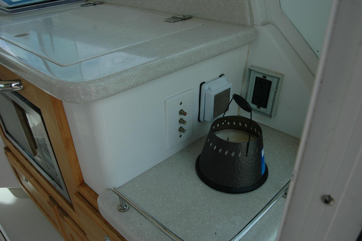 Interior of a 2014 Back Cove 34 boat showing a countertop with a candle holder.