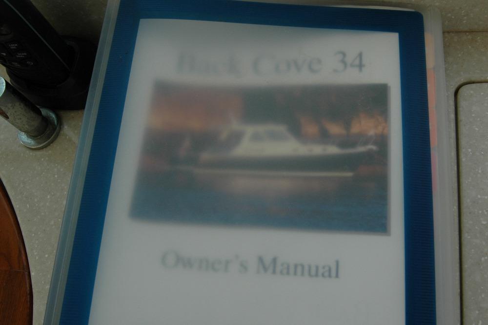 Owneru0027s manual for 2014 Back Cove 34 boat, featuring cover image of the vessel.