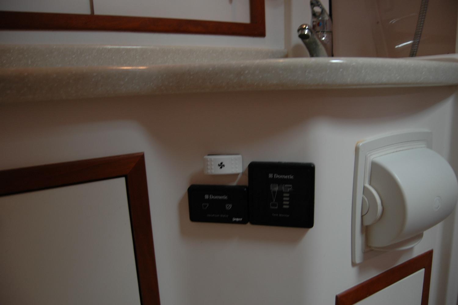 Control panel and outlet in 2014 Back Cove 34 boat interior.