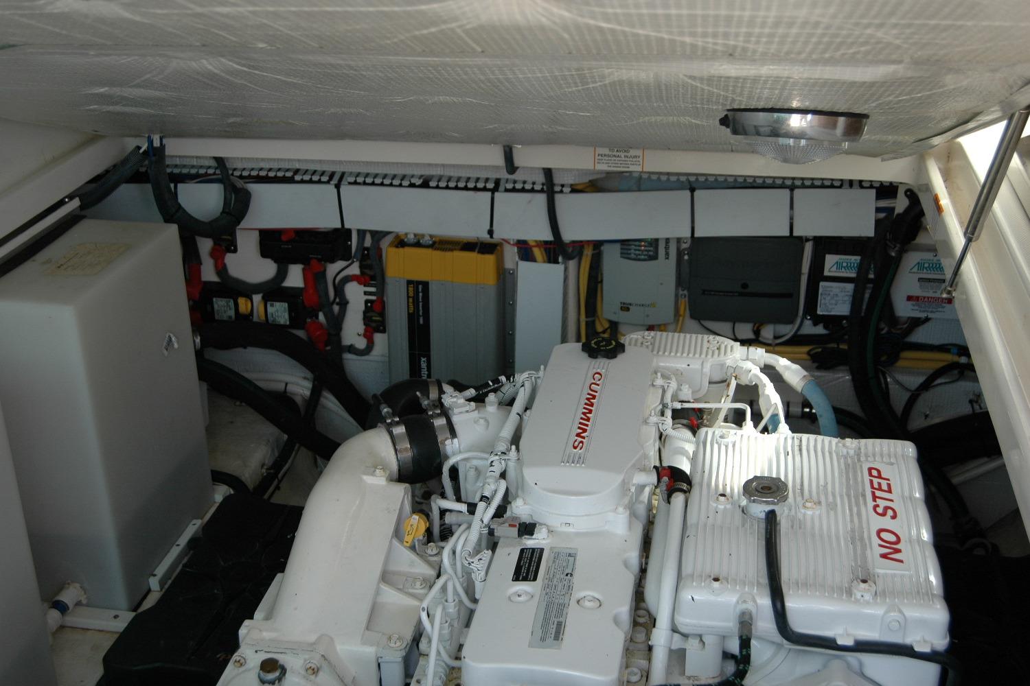 Engine compartment of a 2014 Back Cove 34 boat featuring a Cummins engine.