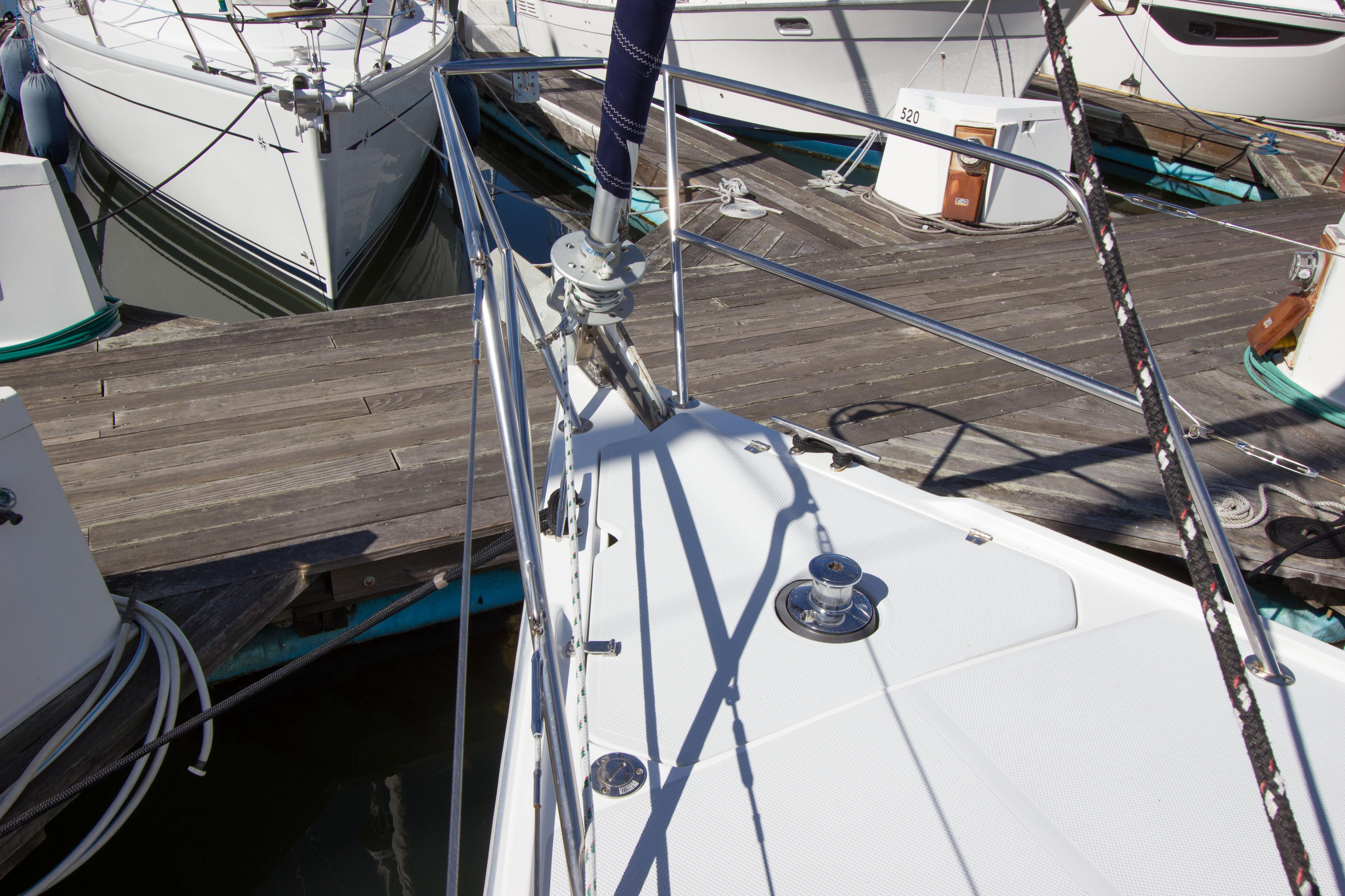 2001 Catalina MK II sailboat docked at a marina, showing deck and rigging details.