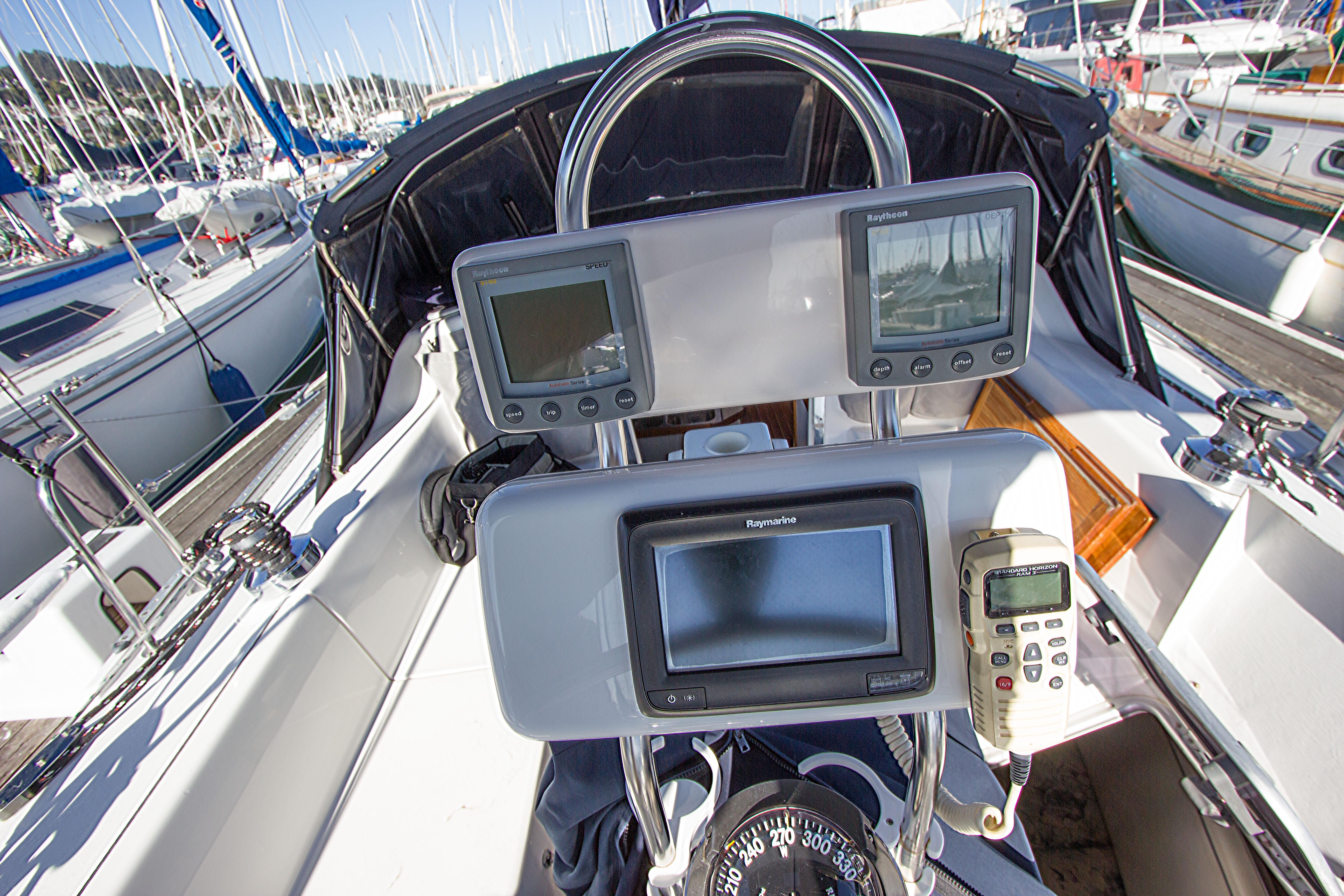 Cockpit of 2001 Catalina MK II sailboat with navigation instruments and compass.
