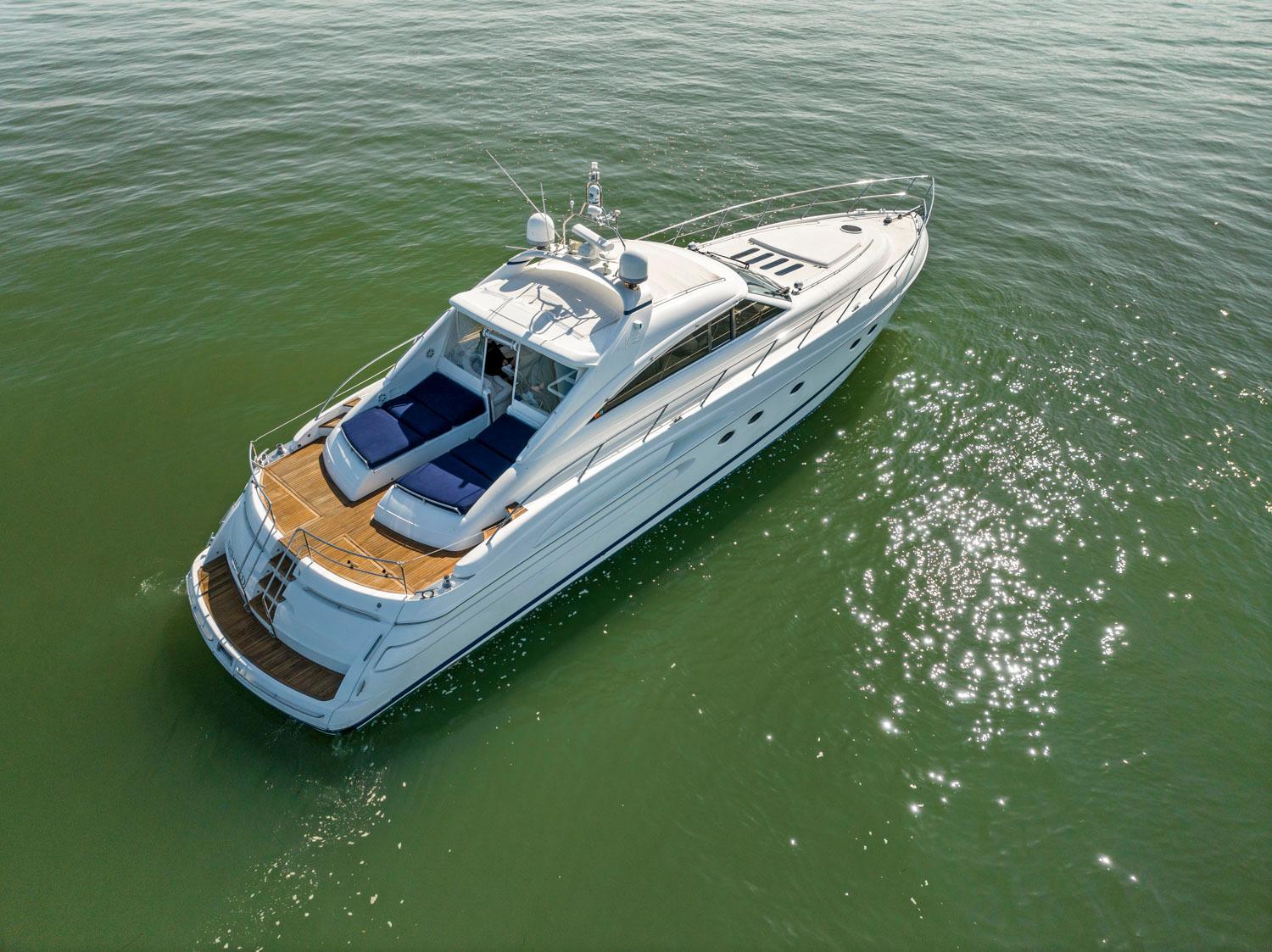 Princess-65 2003-DISMISSED CA-US-Luxurious 2003 Princess 65 yacht cruising on calm, sunlit waters.-8801006 | Thumbnail