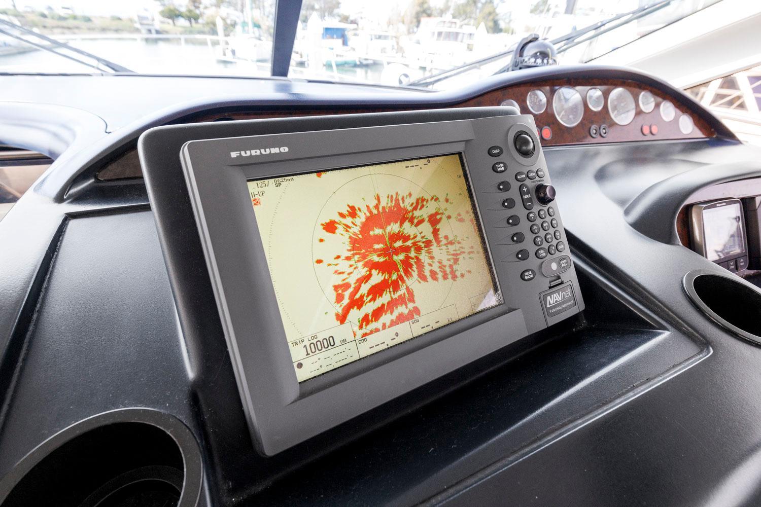 Princess-65 2003-DISMISSED CA-US-Furuno navigation system on 2003 Princess 65 yacht dashboard, displaying radar data.-8801006 | Thumbnail